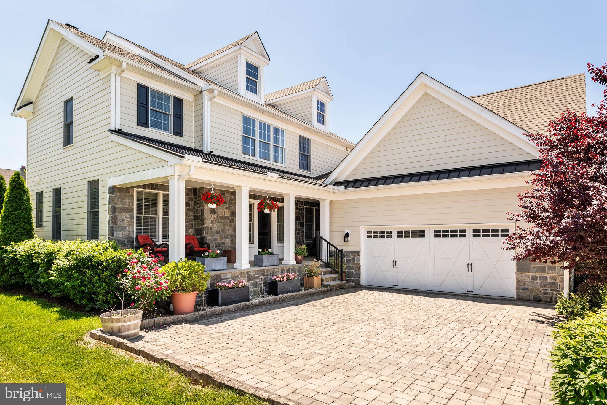 Welcome home to this highly desirable twin carriage home in the sought-after Liseter community of Newtown Square.  Step inside to an airy two-story foyer highlighted by a graceful, curved staircase with upgraded wrought-iron spindles and hardwood floors throughout. The open main level is thoughtfully designed for both everyday living and entertaining, featuring a private office, an elegant dining room with crown and chair rail moldings, and a dramatic family room with a gas fireplace and ceiling fan. This space flows seamlessly into the gourmet eat-in kitchen, complete with beautiful cabinetry, stainless steel appliances, quartz countertops, a spacious center island, and a dry bar just off the kitchen with a beverage refrigerator, perfect for entertaining. The separate pantry features custom shelving, offering both beauty and function. Just off the breakfast room, sliding doors lead to a Trex deck, the perfect spot for al fresco dining or relaxing outdoors. A powder room and attached garage complete the main level.
The second floor offers three bedrooms and three full baths. The spacious primary suite features a walk-in closet with custom California Closets and a luxurious bath with a large frameless glass shower. Each additional bedroom includes its own private full bathroom and walk-in closet, providing comfort and privacy for family and guests alike. The finished basement is impressively large and includes a half bath, offering endless possibilities for recreation, a home gym, or additional living space. The extended two-car garage provides ample room for storage. Timeless exterior details include a charming bluestone side porch, a covered front porch, and the rear Trex deck—making entertaining a breeze. This home has been meticulously maintained and is truly immaculate.
The Liseter community offers exceptional, country club–style amenities including a clubhouse with fitness center, tennis and pickleball courts, bocce ball, an infinity-edge pool, open-air pavilion, scenic walking trails, and a 6,000-square-foot award-winning barn for social gatherings. Ideally located next to the prestigious Episcopal Academy and just minutes from the vibrant towns of Wayne and Newtown Square, with Whole Foods and the popular shops and restaurants of Ellis Preserve nearby. All within the highly regarded Marple Newtown School District.