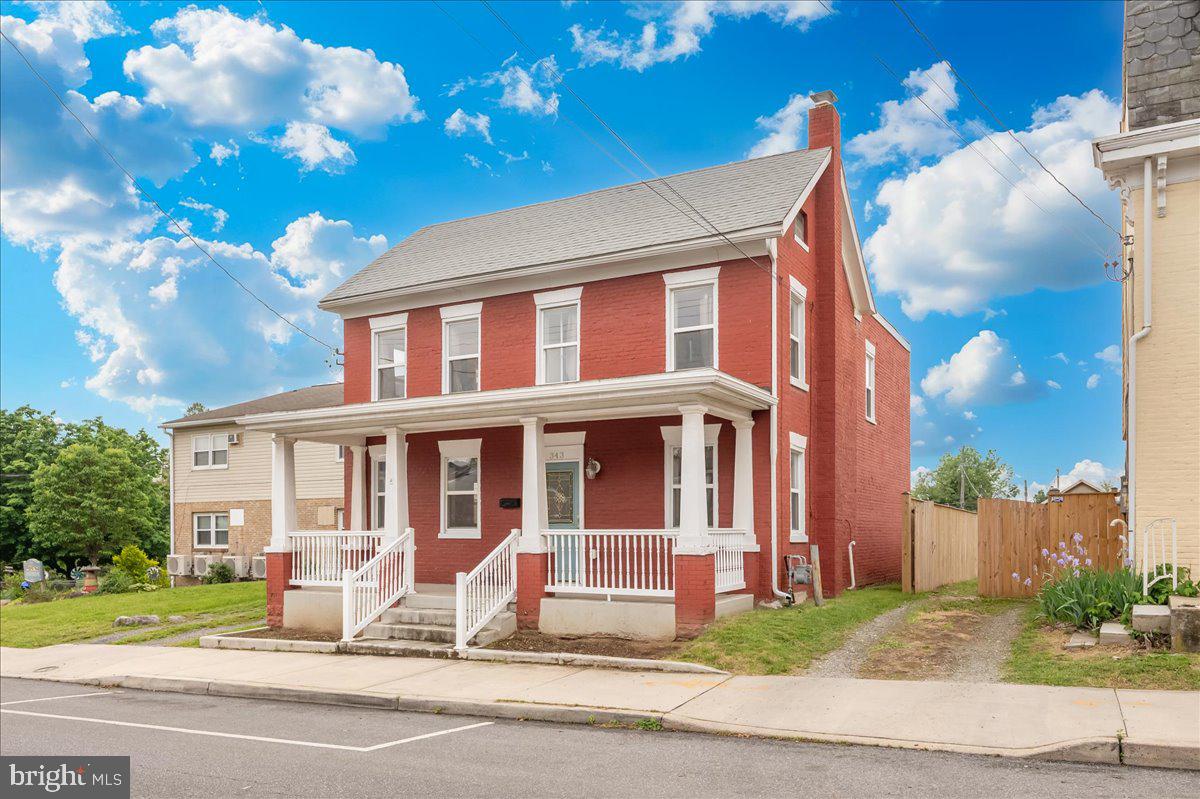 Step into timeless charm with this beautifully updated Colonial home in Hagerstown, originally built in 1881 and thoughtfully modernized for today’s lifestyle. Full of character and modern conveniences, this home offers the perfect blend of historic charm and contemporary comfort. The main level features a welcoming living room, formal dining room perfect for hosting gatherings, and a large modern kitchen with updated finishes and plenty of space to entertain. Upstairs, you’ll find three spacious bedrooms, including a private primary suite complete with its own full bath. Additional stair access leads to an attic area with drywall already installed, offering endless potential to be finished into a home office, playroom, bonus room, or additional living space. Outside, enjoy a sizable backyard complete with a deck — ideal for summer cookouts, relaxing evenings, or entertaining guests. The property also features a large detached garage offering excellent space for storage, a workshop, or the perfect setup for working on a vehicle or classic car. Conveniently located close to commuter routes, shopping, and directly across the street from Fairgrounds Park, this move-in ready home combines location, space, and charm all in one.