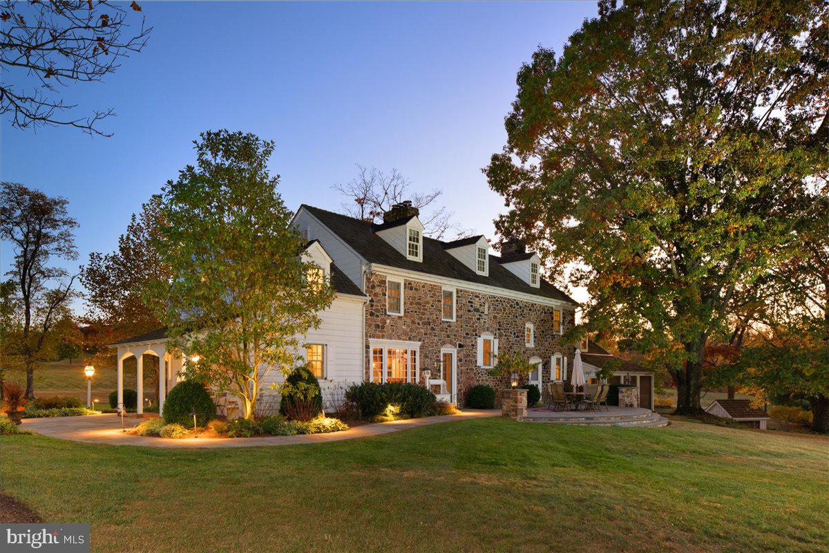 Welcome to Egypt Farm, an exquisite country estate in prestigious Upper Makefield, Bucks County. 
Located just minutes from New Hope and Newtown, this lovely rural and historic 37 acre retreat features a restored and renovated 4,100 SF, 6B, 4.5B farmhouse dating back to pre-Revolutionary War, and a spectacular 7000+ SF barn converted to beautiful living and entertaining spaces.
The house has 5 fireplaces, including one that is said to be one of the largest surviving Colonial fireplaces in Bucks County, an updated eat-in kitchen with Omega cabinetry and Dekton counter tops. The great room has fireplaces at each end and beautiful architectural details. Upstairs, the primary bedroom features a spa-like bathroom with steam shower, and a mirror tv. The lower level has endless possibilities with an additional bonus room, wine bar, beer taps as well as updated mechanicals. 
The barn, designed by architect Joel Petty, has an elevator to reach all levels, boasts 2B and 2.2B, a gourmet country kitchen, 3 fireplaces, a wine cellar, tasting room and a large gathering space with a 9’ x 13’ retracting screen and projector. For the dedicated sportsperson there’s a golf simulator, fiberglass Swimex resistance pool and sauna for all. In addition, Egypt Farm has a carriage house that sits alongside a stunning in-ground salt-water pool and jacuzzi equipped with a beer tap for your next party. Outside the pool is a corn-crib with yet another half bath, changing area and a perfect place for a ping pong table!
This extraordinary property has a security system, Control4 sound system throughout, extensive landscaping, in- ground sprinkler system, mature woods and lovely meadows.
This home is conveniently located to NY & NJ as well as commuter routes.