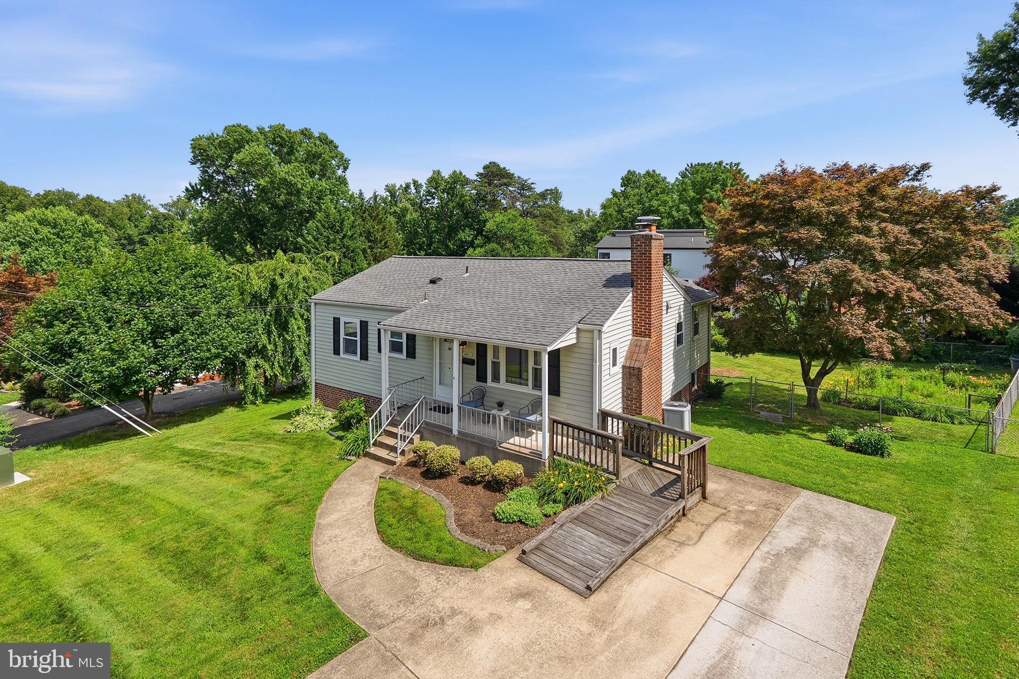 Nearly 3,000 total SQFT in Fairfax City on approximately a quarter-acre lot — this is a great opportunity to own a single-family home at a great price!  The home features 4 bedrooms plus a bonus office/nursery space, a walk-out basement, a large flat backyard, and a spacious rear bump-out addition that creates a beautiful living room off the back of the house. 

The outdoor space is a major highlight, with a welcoming front porch, a beautiful rear deck with stairs down to the large flat and fenced backyard.  Plenty of room for entertaining, play, pets, gardening, or future outdoor living ideas.

Inside, the home offers main-level living, Hardwood flooring, updated windows, a 2018 roof, and great bones throughout. The ramped deck provides added accessibility if needed, and the flexible layout gives buyers plenty of room to make the home their own.