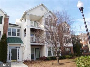 Welcome home to this 2-bedroom, 2 full bath, condo unit with a bonus room.  This spacious residence features an open-concept layout with abundant natural light, carpet, and a kitchen equipped with standard appliances, countertops, and ample cabinetry. The primary bedroom offers an en-suite bathroom and plentiful closet space. The second bedroom provides flexibility for guests or others. The bonus room can be used as a 3rd bedroom/den/ office w/ French doors. Opportunity for the right buyer to make this home their own. Ideally situated in the sought after Garden Owings Mills community, minutes from dining, shopping, and major commuter routes. Quiet and secluded community. Secure building. This Jewel won't last long! Schedule your showing TODAY!