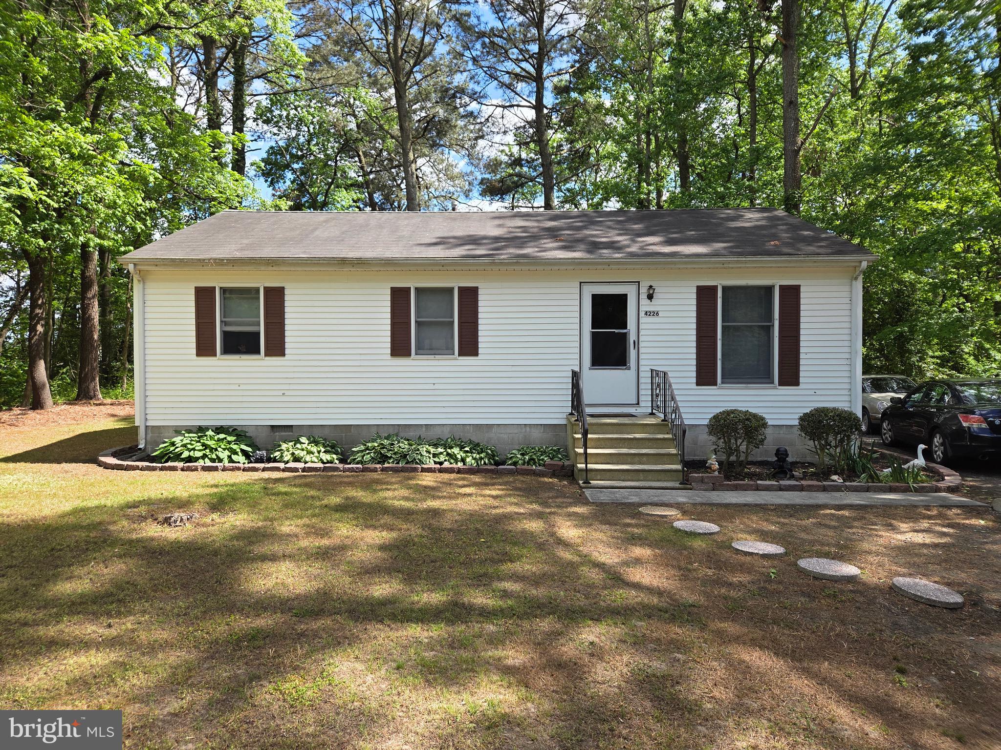 Charming neighborhood just outside of the Historic Town of Snow Hill. This 3 bedroom 1 bath home is situated on a lightly wooded lot that has a secluded feel, even though it is in a small development(NO HOA!) Located just off of Route 113 southwest of Snow Hill, and just minutes away from all Schools, Byrd Park and All points on the Coast, Ocean City, Assateague, and the Chincoteague Bay at Public Landing, as well as Chincoteague Island itself, noted for its' annual 'Pony Swim' from Assateague Island, and Home of 'Misty!' This homes solid bones are ready for your personal touch!