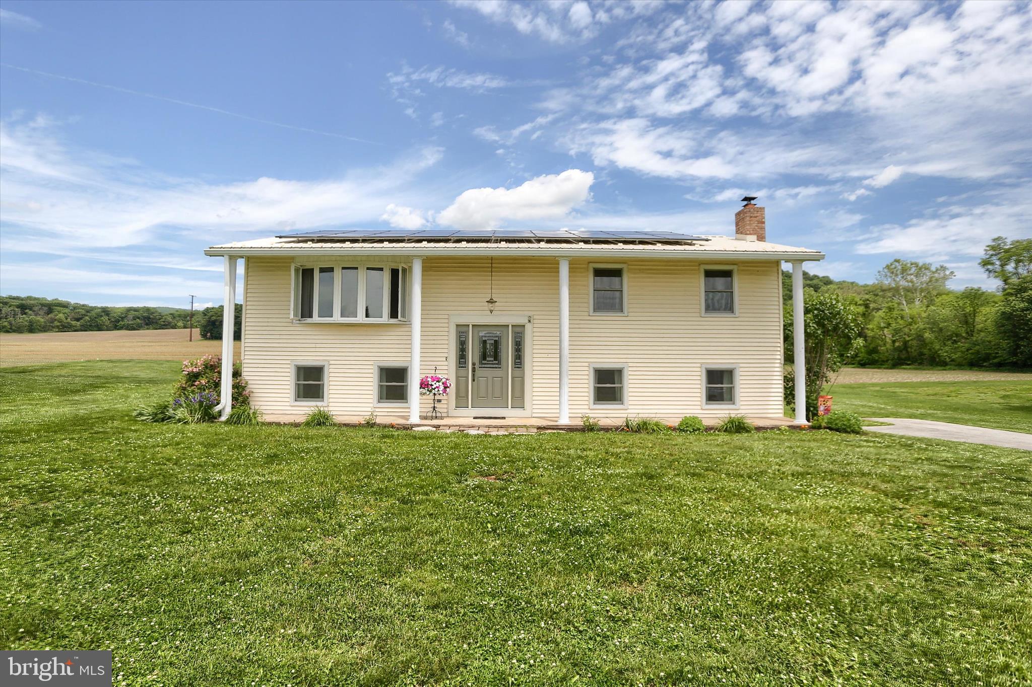 Located at 95 Pawnee Lane in Halifax. Look outside at this impressive oversized 30x40 detached garage, which provides exceptional space for vehicles, hobbies, storage, or a workshop setup, making it a standout feature of the property.  Perfect for the car enthusiast. This inviting 3-bedroom, 1-bath detached home offers peaceful country living with beautiful pasture views that create a serene backdrop year-round. The property features numerous recent updates, including new windows and doors that enhance both energy efficiency and overall comfort.  Pet owners will appreciate the included invisible fence, offering added convenience and security. With its blend of practical upgrades, scenic surroundings, and generous outdoor amenities, this home presents a wonderful opportunity to enjoy quiet living with room to spread out.
