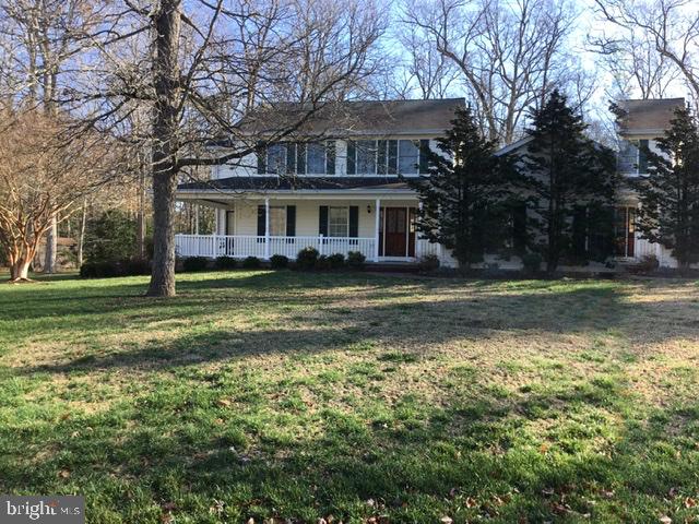 What a buy! Well constructed colonial on 1.35 Acres backing to mature hardwoods.  Beautiful decking on the back to enjoy the view, established small community of Foxhall with other custom homes on similar larger lots, great back yard area for entertaining, wide wrap porch on the front, perfect for a porch swing or outdoor furniture, new carpet thru out, solid wood cabinetry, master has adjacent room that is 4th bedroom or could be a nursery or office.You won't be disappointed !  Direct Endorsed lender a must. No home sale contingencies