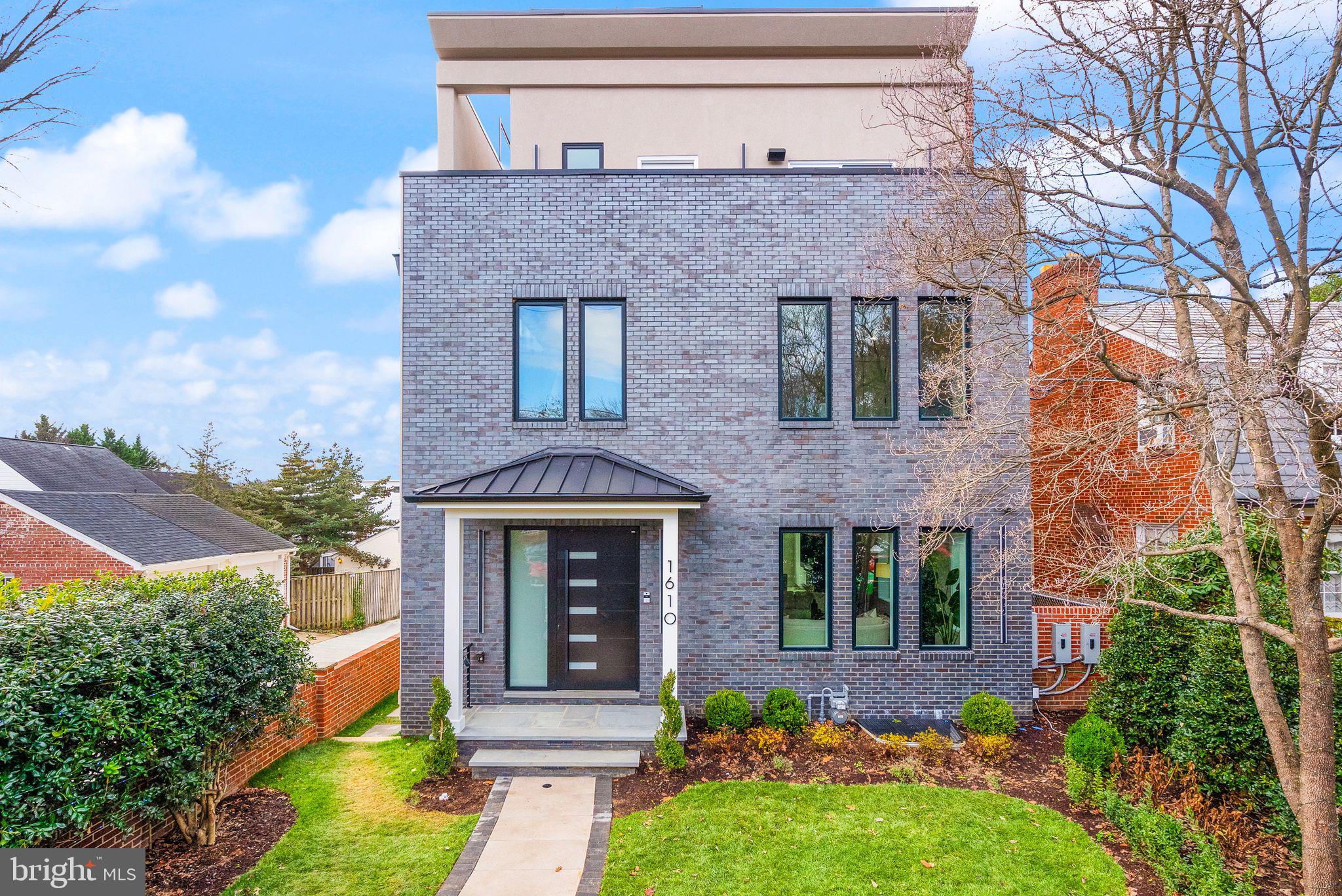 Once upon a time, in the Palisades, located at 1610 Foxhall Road NW, stood a breathtaking residence that redefined luxury living. This magnificent 7-bedroom, 6-full-bathroom, 2-half-bathroom home wasn't just a house; it was a sanctuary where every corner whispered tales of elegance and modern convenience.

The journey begins on the main level as you step inside, where 4 1/4" red oak flooring guides you through sun-drenched living spaces. The custom-made European aluminum front door opens to reveal a grand entrance, leading to a cozy gathering around the wood-burning fireplace, where stories of family and friendship unfold against its warm glow.

The heart of this home beats in the gourmet kitchen, a culinary paradise adorned with high-end Leicht German cabinets, exquisite stone countertops, and top-of-the-line Thermador appliances. Here, a built-in coffee maker and beverage cooler are at your fingertips, perfect for hosting delightful breakfast conversations or evening soirées. Adjacent to this culinary haven, a half bath conveniently sits near the wet bar, ensuring that every occasion is met with sophistication.

Wander upstairs to discover the private retreat of the primary suite, a haven of relaxation featuring a spa-like bathroom with a walk-in shower and a luxurious soaking tub. The allure of this suite is further enhanced by private balconies that offer a moment of tranquility, while the rooftop deck invites you to soak in the breathtaking views and starlit nights.

The second level unfolds with three additional bedrooms and two full bathrooms, providing ample space for a growing family or cherished guests. Descending to the lower level, you'll find a comfortable bedroom and full bath, a versatile den or gym, and laundry facilities, all tucked away for convenience. For added flexibility, a separate ADU unit boasts two bedrooms and two full baths, ideal for family, friends, or a potential rental opportunity.

Beyond the walls of this enchanting abode, the exterior greets you with a two-car garage and mature landscaping that enhances privacy while adding a touch of nature’s beauty. A rear deck and a charming patio adorned with a pergola invite you to bask in the sun, while a vegetable garden promises the joy of homegrown produce.