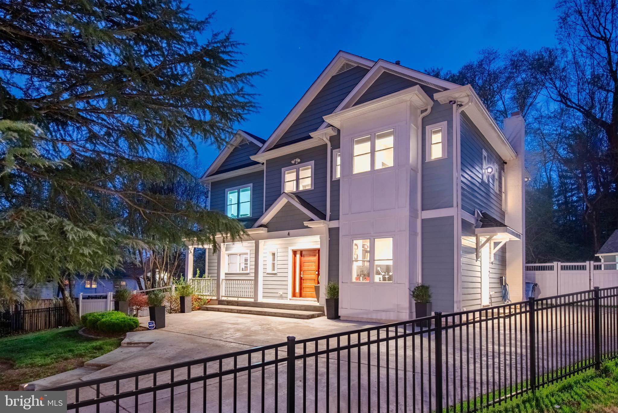 MULTIPLE OFFERS RECEIVED. *Ideally nestled in the North Bethesda Area with a Kensington Address*, this beautifully reimagined Transitional Craftsman home offers the perfect blend of timeless charm and modern luxury. Originally built on its existing foundation, the home was completely rebuilt from the ground up in 2014, delivering peace of mind with updated systems, roof, windows, and high-end finishes throughout—all thoughtfully designed for today’s lifestyle and long-term comfort. The exterior wall assembly features Hardie Plank siding, ZIP sheathing with integrated foam insulation, brick, 2x6 framing, and drywall, resulting in a highly energy-efficient, well-insulated structure.

Step inside to a bright, open-concept main level with 9-foot ceilings, where an oversized kitchen serves as the centerpiece. Designed for both style and functionality, it showcases white quartz countertops, imported Italian LineAquattro cabinetry, Jenn-Air and Bosch stainless steel appliances, under-cabinet lighting, and built-in hot water and soap dispensers. A large island anchors the space, while a charming breakfast nook with smart pendant lighting adds warmth and character. The kitchen flows seamlessly into the inviting family room, highlighted by a custom-built-in media center—perfect for everyday living and entertaining.

The main level also includes a versatile bedroom and full bath, ideal for guests, a home office, or multigenerational living. Upstairs, three spacious bedrooms feature walk-in closets with Elfa shelving systems, smart lighting, and 10G LAN connectivity. The primary suite offers two custom walk-in closets and a spa-inspired bath with a soaking tub, walk-in shower, dual floating vanities with backlit mirrors, a private water closet with its own sink, and a built-in bidet system. A convenient second-floor laundry room includes cabinetry, a Samsung washer and dryer, and a utility basin.

The fully finished lower level expands the living space with a large recreation area, full bath, and extensive storage, including a utility room with a workbench and racks. A dedicated media room (fifth bedroom) delivers a true home theater experience with a 4K/3D projector, 100-inch screen, Pioneer 7.1 receiver, and tiered seating platform. An unfinished kitchenette space with water and drain rough-in offers future flexibility.

This home is rich with advanced infrastructure, including Cat5e wiring with 10G LAN, multiple network switches, whole-house audio prewiring, and a central smart hub. A dedicated office includes conveying furniture, a TCL 4K monitor, and a Lorex 4K Ultra HD security system with eight cameras. Additional features include a Brinks alarm system, an integrated humidifier, LED recessed lighting, spray-foam insulation, spray-foam-insulated windows with a warranty, insulated tubs, and a high-capacity 80–85-gallon hot water tank designed for simultaneous use.

Outside, enjoy a level 13,169 sf lot with a fully fenced backyard that backs onto parkland for added privacy. The outdoor space features a low-maintenance Trex deck, stone patio, and professionally maintained landscaping. A standout feature is the climate-controlled workshop built on a slab foundation, complete with 240V/120V power, epoxy floors, smart lighting, stainless steel cabinetry, and its own security system. Additional highlights include underground gutter drainage, Aquor water spigots, motion-sensor lighting, and Ring doorbells.

Ideally located less than a mile from White Flint Metro and minutes from Pike & Rose, this move-in-ready home offers exceptional quality, thoughtful design, and modern convenience in one of Montgomery County’s most desirable communities.