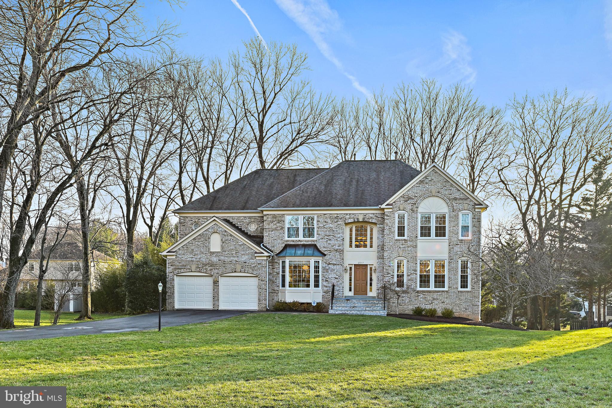 Elegant residence nestled in an exclusive cul-de-sac. This fabulous colonial is conveniently located in the heart of Tysons Corner. Situated privately on a .40 acre lot, this property boasts a long private driveway and an oversized front yard perfect for outdoor activities and games. This spectacular Stanley Martin Winslow model features grand welcoming 2 story foyer and gracefully curved staircase. Formal living room and dining room on each side of the foyer offer luxurious and sophisticated entertaining space. Centrally located home office/study on the main floor provides an ideal space for remote work in the modern age. The distinctively large family room and sunroom offer a private gathering area with a view to mature trees in the backyard. The updated kitchen has upgraded porcelain tiles and is equipped with stainless steel appliances, a build-in combination microwave and wall oven, top of the line kitchen cabinets with soft close feature and exquisite Saturina granite countertops. Upper level features a sophisticated circular hallway offering a spectacular view of the open foyer and family room, 4 large bedrooms highlighted by a spacious primary suite with sitting area, a walk in closet and 2 large closets, and a huge master bathroom, a second suite with a private bathroom and secondary bedrooms with Jack and Jill bathroom. The custom designed lower level presents ample space for work, entertainment, exercise and room for special guest. The potential for creating a personalized vacation retreat in your backyard is unlimited. Brand new maintenance free insulated windows with Low-E glass and argon gas throughout the entire house.  New flagstone front steps with brick veneer and metal railings. New walkway with modern concrete pavers. Newly painted exterior. All new insulation in attic boasting the R value for energy efficiency. Superb location with easy access to transportation, minutes to metro, shopping, leisure, city life, performing arts at Wolftrap, parks, hiking trails including Great Falls and numerous upscale restaurants, all at your fingertips. Welcome home!