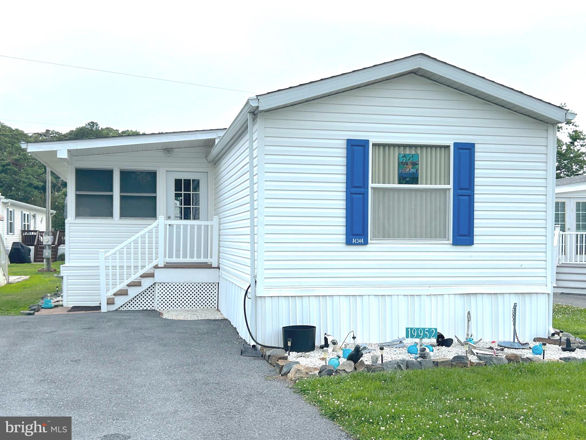 Whether you're searching for a year-round residence or the perfect beach getaway, this well-maintained home is a must-see! Ideally located just minutes from Rehoboth Beach, the boardwalk, and all the area's attractions, you'll also enjoy the convenience of walking to the Tanger Outlets, nearby restaurants, and the DART bus stop.  Located in the desirable Sea Air Village community, this spacious 3-bedroom, 2-bath home offers an open and inviting floor plan. The large kitchen flows seamlessly into the living area, creating a flexible space that's perfect for everyday living or entertaining. The private primary suite is situated on the opposite side of the home from the two additional bedrooms, providing added privacy for owners and guests alike.  Additional features include central air conditioning, gas heat, a full-size washer and dryer, and a large enclosed porch—an ideal space to relax with your morning coffee or entertain family and friends.
Sea Air Village offers an exceptional lifestyle with outstanding community amenities, including a swimming pool, clubhouse, playground, dog park, and more. The property is subject to an annually renewable leasehold interest with a current lot rent of $717 per month, lot rent includes lawn cutting and trash removal. The property is subject to an annually renewable leasehold interest.  Future lot rent increases are capped in accordance with Delaware law (25 Del. C. §§ 7050–7054). Sale is subject to park approval.  Don't miss this opportunity to own an affordable year round residence or vacation coastal home in one of the area's most convenient locations!