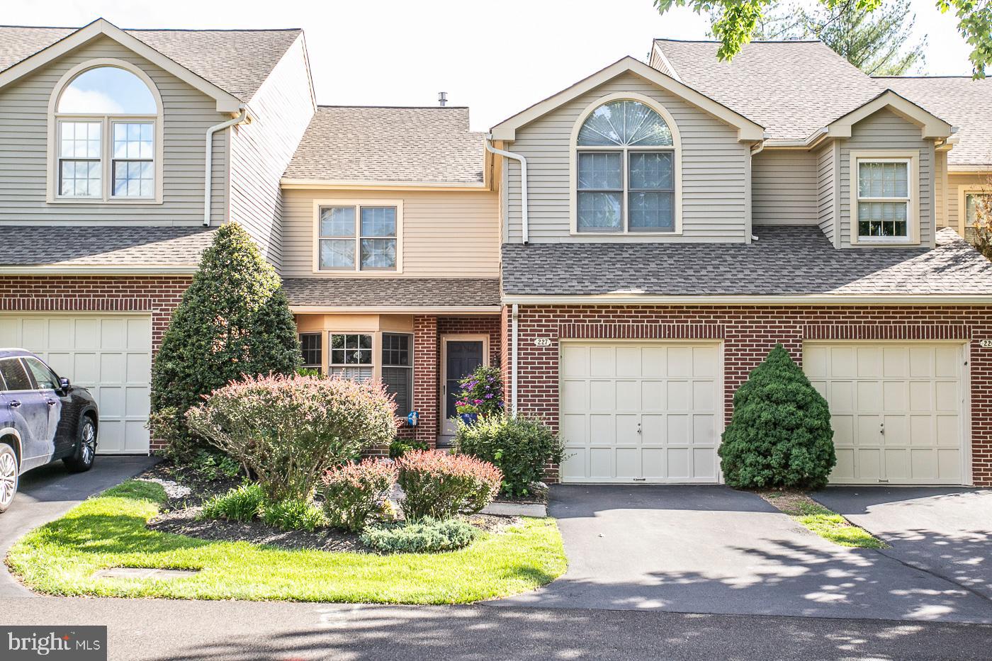 Welcome to 227 Towyn Ct. - a rare two bedroom, 2.5 bath townhome located in the desirable community of Gwynedd Hunt.  The home boasts over 1700 square feet of living space with an open floor plan on the main level.  The front entry courtyard enters into the foyer which has hardwood flooring.  The L-shaped living area has a great room with cathedral ceiling and a wood burning fireplace and a dining room with French doors leading out to the spacious, private deck.  Enter the eat-in kitchen from the foyer or the dining room where you will find white cabinetry, a large peninsula/island, all newer appliances, and hardwood floors.  A large breakfast nook beside the bay window has views of the front garden.  A half-bath off the foyer and a coat closet complete this level.   Head upstairs to a loft area overlooking the great room.  This can be used an an office or study area for students. There is a large primary bedroom with a walk-in closet and second closet.   The ensuite bath has a tub and tile surround shower stall.  The second bedroom also has an ensuite full bath.  The washer/dryer is conveniently located on this level.  The full basement is dry and perfect for storage.  It can also be semi finished to add to your living space.  This home is in the highly rated Wissahickon SD and the sought after Gwynedd Hunt community.  It is walking distance to the Springhouse Shopping Center with Whole Foods, Giant, CVS, Starbucks and numerous restaurants and shops.   The Ambler train station is 10 minutes away, and there is easy access to Routes 309, 202 and the PA Turnpike.  Call today and schedule your showing!