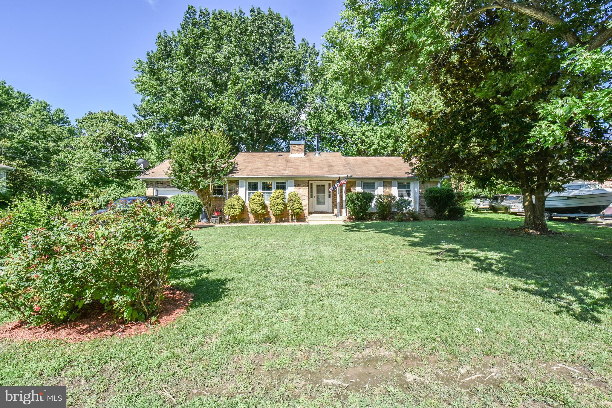 Adorable 3 bedroom 2 bathroom rambler with a 1 car garage on a completely flat lot! This house is perfect for entertaining with the back deck and large flat front and back yard! Inside you will find wood floors throughout! You will also find an Eat-in Kitchen, Dining Room, Family Room, Master Bedroom, Master Bathroom, Hall Bathroom & 2 Additional Bedrooms!