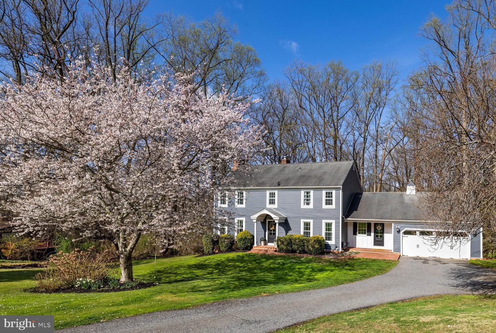 Coming Soon!!! Beautifully Updated and Expansive Center Hall Colonial in Holly Knoll  The Heart of This Home is the Open Kitchen and Family Room w/ Center Island, Granite Counters, Stainless Steel Appliances, Wood Floors, Wood Burning Fireplace & Built-Ins.  Separate Dining Rm and Spacious Living Room Areas, as well as Main Level Laundry. Upper Level Features 4 Generous Sized Bedrooms, 2 Full Baths. Lower Level Expands Your Living Space with Additional Family Room, Office, Full Bath and Potential Bedroom/Gym/Office!!! This Serene Park-Like Setting is Enjoyed Best on the Over-Sized Rear Deck & Its Gorgeous Views. New Siding, Doors, Gutters & Portico,  Newer Furnace and HWH and Much More!