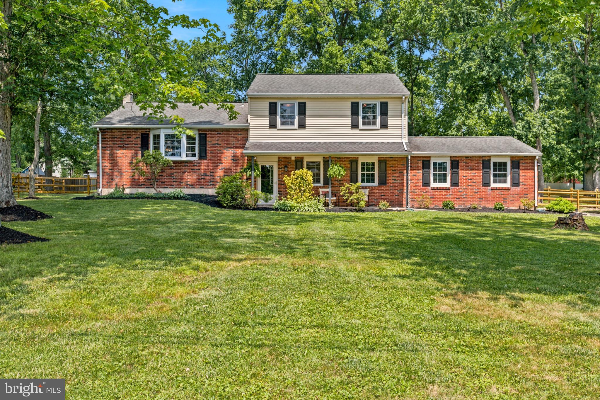 Set on a sunny and level 1 acre lot in Central Bucks School district this updated and charming split level is move in ready.  This bright and open home has been lovingly updated and offers plenty of space to roam. The main entry leads to an expansive living room with fireplace that opens to a 3 season porch that over looks the large back yard. There is an updated eat in kitchen with island, recessed lighting and sliding doors that open to the freshly updated deck. The additional large family boasts recessed lighting, hardwood floors and a bay window that fills the room with natural light. The upstairs provides a spacious primary bedroom with full bath and two more generous size bedrooms and hall bath with tub. The lower level offers an additional space for storage, play room, gym or workshop. The oversized 3 car garage is great for tools, storage or a hobby vehicle. A great opportunity to be minutes from Doylestown and close to rt 202, 152 & 611.  This is a great property for outdoor activity and comfortable living. Schedule your tour today!