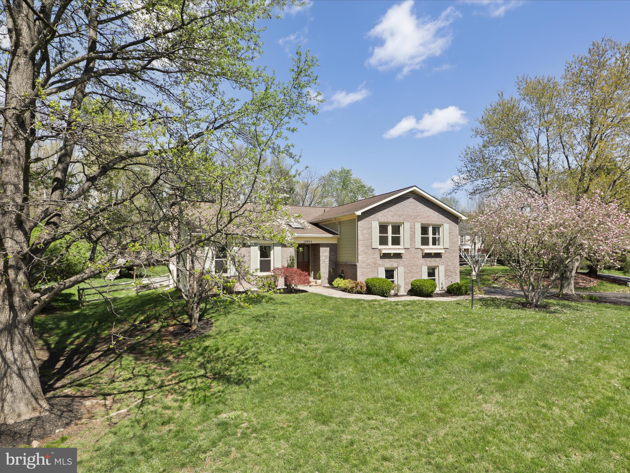 Welcome to this lovely home in Berryland Farm of Oakton! As you enter, you'll be pleasantly surprised by the spaciousness, featuring an open floor plan and high ceilings that create an inviting atmosphere. The organic separation of spaces keeps everything connected, ideal for both comfortable living and entertaining. This four-bedroom, three-bathroom home includes a generous tiled foyer with two hall closets and a light-filled living room with hardwood floors. The updated kitchen is a cook's delight, with custom cabinets, black walnut counters, updated appliances, and hand-painted tiles from Portugal. Enjoy your morning coffee in the breakfast room with a bay window, offering beautiful views of the pool. The deck has been refurbished for your comfort, making it perfect for outdoor relaxation. Additionally, you'll find a family room with cathedral ceilings and a restored beam from an old school in Washington, D.C., which was built in 1938. Charm & more Charm! This home has been freshly painted throughout, and the primary bedroom offers ample space with multiple closets and a light-filled bathroom featuring a separate shower stall and floating bathtub. 
And that's not all! The lower level of this home features  a large recreation room, and a bedroom with a full bathroom; ideal as a guest room offering privacy or even a home office. Walkout from this level to the backyard, where you'll find a sumptuous swimming pool perfect for relaxing on warm days. There's also a playset for the kids with a climbing wall , a flat fenced in backyard, providing a playground like area for outdoor activities. 
Berryland Farm offers amenities like tennis, pickleball as well as two tot lots. The common grounds are beautifully maintained and inspire many neighbors to walk and socialize. Residents also enjoy nearby walking trails. The HOA hosts a variety of events throughout the year should you choose to participate in. Events may include an annual picnic, Easter & Halloween parades, Holiday parties and on occasion Food Trucks are invited to the neighborhood as well.
Don't miss out on this fine home, nestled on a quiet cul-de-sac lot. It's the perfect blend of tranquility yet community if you wish it to be. Come and see it for yourself!