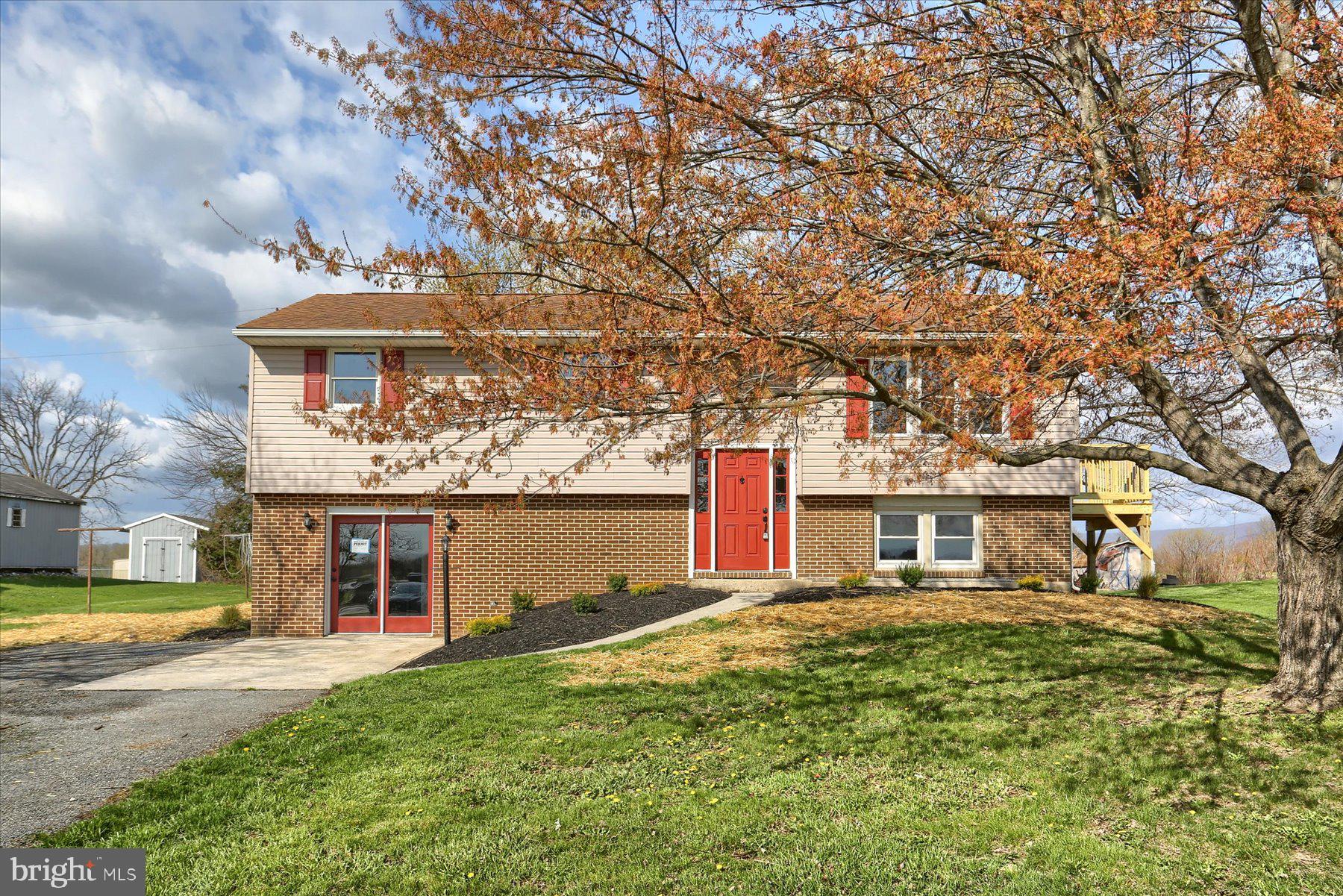 Such an amazingly remodeled home on almost 1 acres property in Big Springs school district! 2 remodeled bathrooms, beautiful kitchen with new appliances (most of them), new plank flooring, new paint all around and a new deck, just to name a few of the remodels. Just so well done! This is a 4 bedroom and 2 full bath home with an amazing back yard. The 1st floor has a huge eat in kitchen, with a is great space for a dining room table and an attached new deck for outside enjoyment. The living room is beautiful and bright. You also find  3 bedrooms and a 1 full bath on this floor. You could make a great parent-in-law or teenage-quarter in the lower, walk-out level. There is a bedroom area, huge walk in closet, laundry room , bathroom and family room with a great fireplace. Park the car, walk right in and enjoy! Come by and visit this home soon, this is  a home you do not wish to miss.