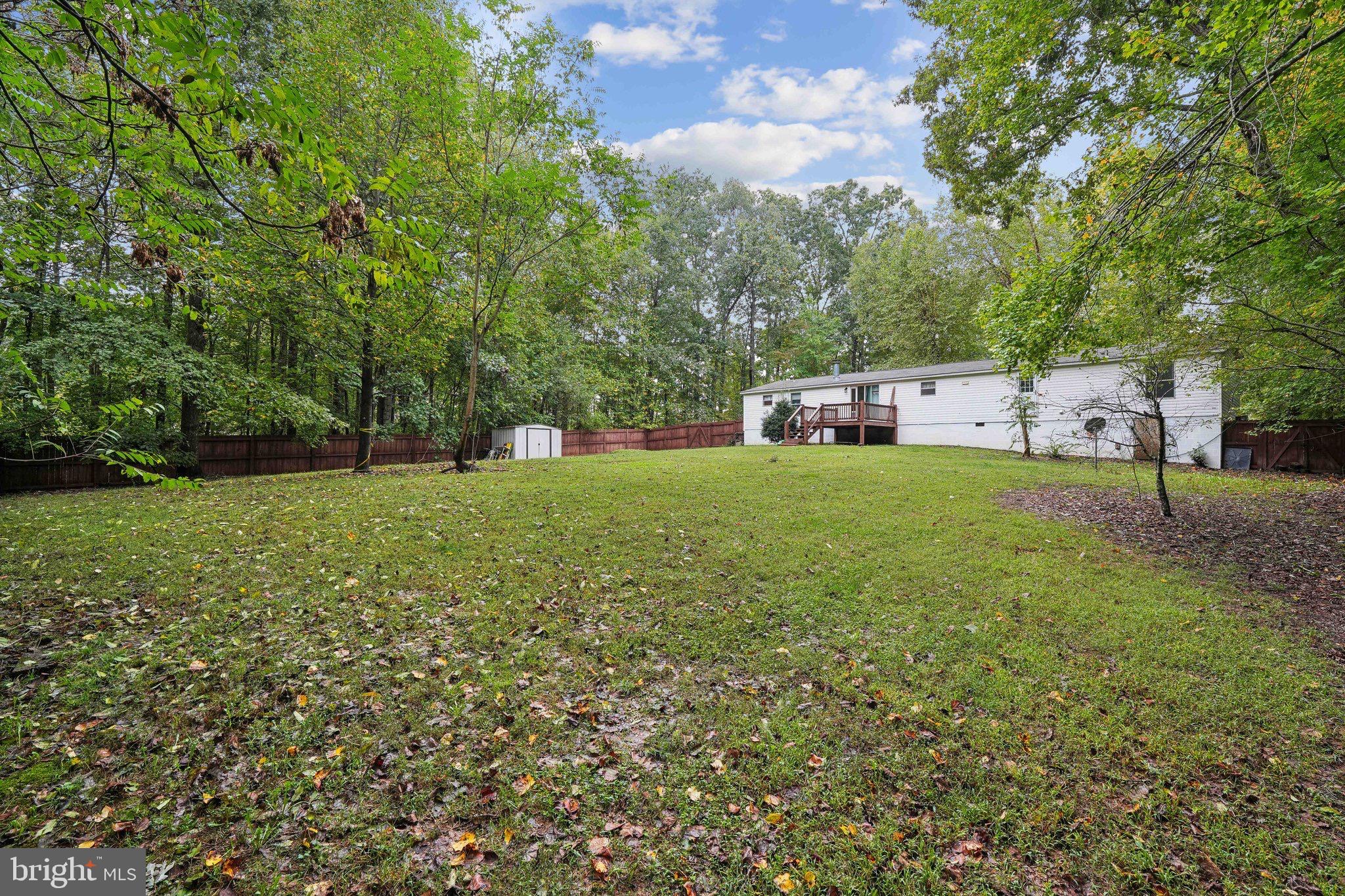 Beautiful four bedroom, two full bathroom home nestled into the countryside on two wonderfully wooded acres. As you enter this home you will find a large master bedroom to the right with the other 3 bedrooms on the other side of the home down the hallway.  The master bedroom features a master bath, closet and BONUS ROOM! Bonus room could be used as walk-in closet, storage or even a nursery. To your left you will find an adorable formal dining room or potential office. This home has a spacious living room that features a fireplace to snuggle around during the winter months while sipping on your hot cocoa. Enjoy the peaceful tranquility of nature from your back deck as you gaze into your large fully fenced backyard. Perfect for all your summer gatherings, let the dogs run freely or the children play. This backyard also features a nice storage shed to hold all your lawn and garden tools. The homes roof is also only two years old! Work from home or stream away with Firefly High Speed Internet! You will also find ample parking with its freshly re-graveled driveway! Home sits on the Fluvanna and Louisa County Line,  MLS states Louisa County Public Schools but public records state Fluvanna County Public Schools. (Taxes paid to Fluvanna County) *UPDATE* NEW  Runtru HVAC System Installed 02/09/2025 INCLUDES a 5 Year Warranty! This home is conveniently located minutes from I-64, 10 mins to Zion Crossroads, 25mins to Charlottesville, 20mins to Louisa and only 14mins to Palmyra.
(Roof and Heat Pump replaced 2022)