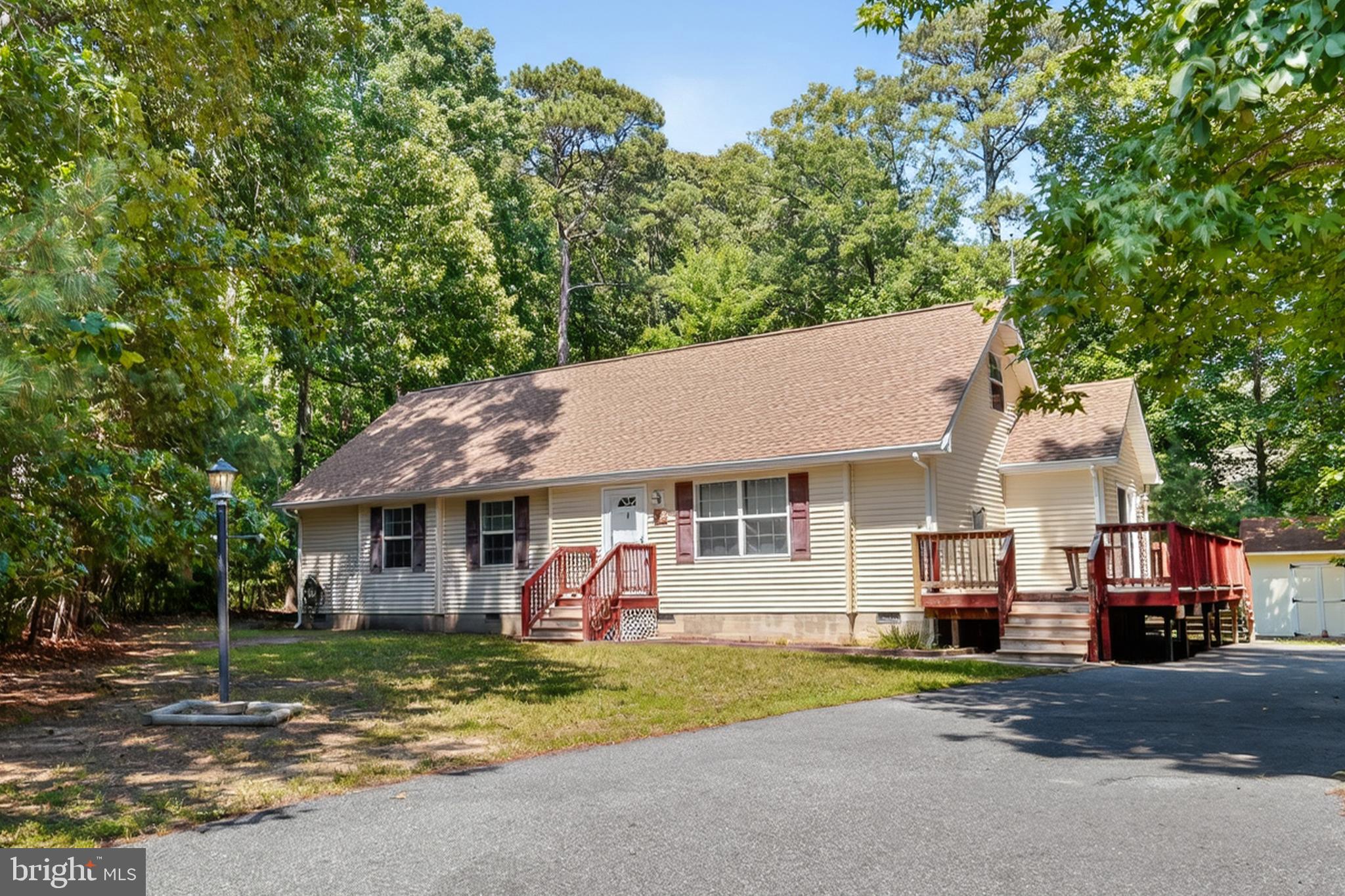 6/20 Tucked away on a quiet cul-de-sac is where you’ll find this 3 BR/2 BA home on an oversized lot with room to expand to fit your lifestyle. As you enter the home you’ll find an open floor plan, the Living Room has LVP Flooring, fireplace and book shelves. The kitchen and dining area have ample space, lots of cabinets, a center kitchen island, gas stove and tile flooring. Primary suite has new LVP flooring, walk-in closet and a private bath with stand-up shower and soaking tub and double bowl sink. Two additional bedrooms, a full bath complete and laundry area with sink complete the first level. Recent updates include a new roof in 2025 & new Gas Pack HVAC 2026. The second level has not been finished off, an open slate for endless possibilities. Plenty of room for entertaining on the outside deck approximately 12x30, paved driveway and shed. Captains Cove Golf & Waterfront Community is the fastest growing Golf & Waterfront Community on the Eastern Shore of VA, Amenities offered: 9 Hole Pristine Golf Course, 3 Pools (2 Outdoor/1 Indoor), Fitness Center, Boat Ramp, Basketball & Pickle-ball Courts, Playground, Picnic Area, Dog Park, Biking & Walking Trails, Security and more. Call for your private showing!
