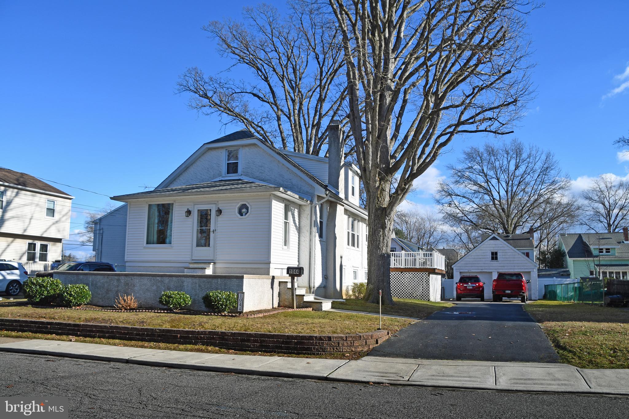 PRIDE OF OWNERSHIP shows in this updated and extremely well maintained  4 bedroom 2 bath single with 2 car detached garage on an extra wide lot in the heart of Ridley Township. From the first steps into this house you can see the pride of ownership and feel the warmth of home. Enter through the front room (playroom, reading room, additional living room) into the huge carpeted (over hardwood) living room with solid stone wood burning fireplace, 2 large bedrooms, updated main bath, updated eat-in kitchen with breakfast bar. Upstairs there are 2 additional bedrooms and an updated full bath. Huge, clean unfinished basement with newer heater and laundry area. 2 car detached garage with long asphalt driveway for plenty of off street parking. Newer roof, newer heating and a/c system, replacement windows. Literally the cleanest most well kept property I have ever listed.