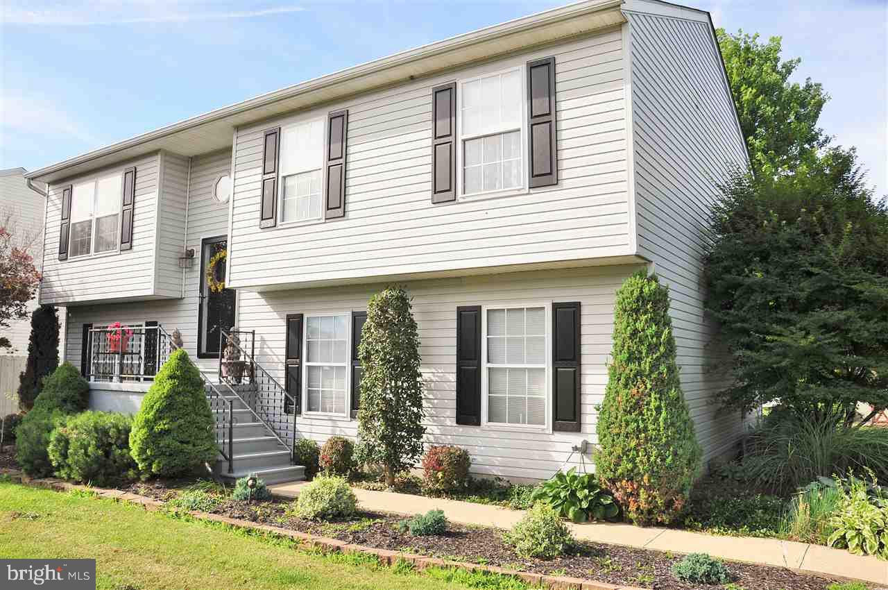 Spectacular home situated on almost 1 acre! Meticulously maintained and just minutes from the MD/PA line! So much to offer! Newer windows, floors, heating system, finished lower level, stainless steel  kitchen appliances!  Outdoor features include a two-tier deck, large, flat yard, and a storage shed. If you're looking for move-in ready this is it! USDA eligible area! Schedule your tour today!