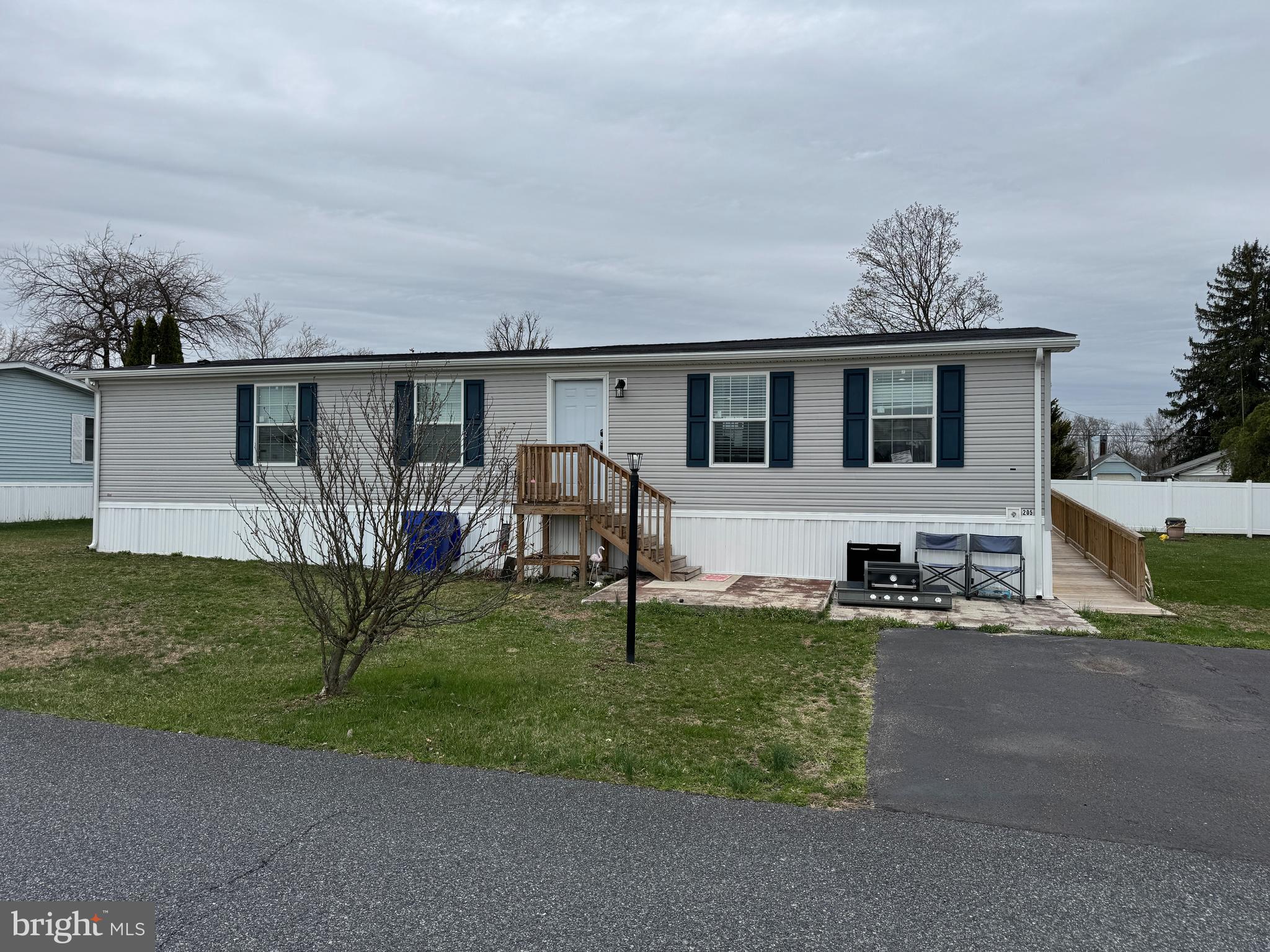 IMMACULATE 2022 MOBILE HOME WITH MODERN COMFORTS AND ACCESSIBILITY! Step into this exceptionally clean and meticulously maintained 3-bedroom, 2-bathroom home that offers the perfect blend of comfort, functionality, and style. Built in 2022, this nearly-new home features a spacious living room, a bright dining area, and a beautifully designed kitchen complete with a center island—ideal for cooking, gathering, or entertaining. Designed with accessibility in mind, the home boasts wide hallways and a wheelchair ramp for easy mobility throughout the space. You’ll also love the added convenience of a 9x9 utility shed, perfect for extra storage. From the modern finishes to the thoughtful layout, this home is move-in ready and shines with pride of ownership. Don't miss your chance to own a low-maintenance, like-new home that checks all the boxes! Just miles from historic Gettysburg, PA! This property will be offered at auction on Wednesday May 14, 2025 @ 3:00pm. The List price in no way represents a minimum, starting, or acceptable bid.