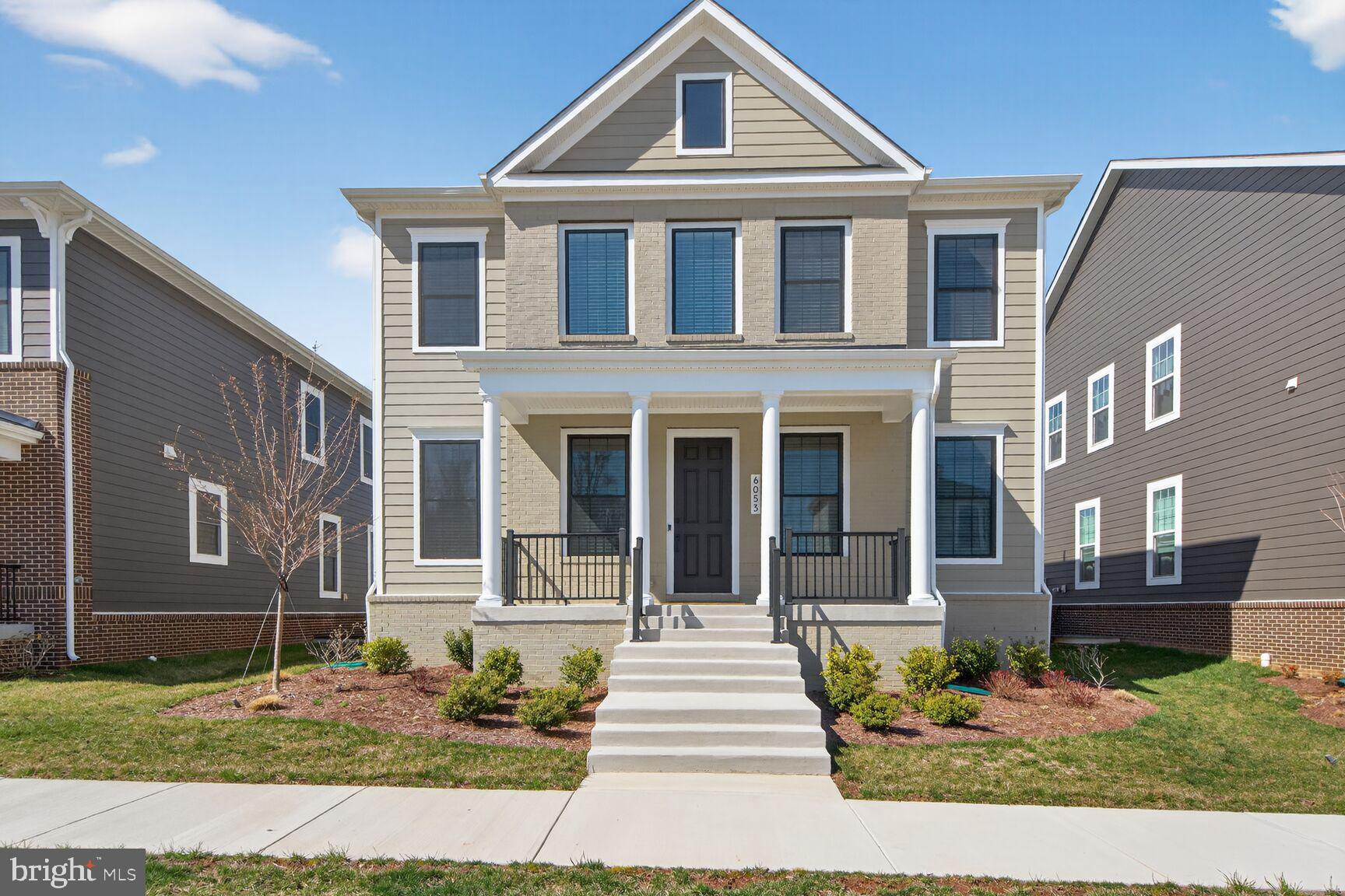 Skip the wait for new construction! This pristine, 1-year-old residence in the sought-after Heritage at Marshall community offers nearly 4,500 sq. ft. of meticulously designed living space across three finished levels. Featuring 5 bedrooms and 4.5 baths—including two primary suites and a recently finished basement—this home is perfectly tailored for both everyday living and grand entertaining. The main level is defined by a light-filled two-story entry, stunning LVP floors, and an open floor plan. A spacious kitchen with stainless steel appliances, a large island, and ample cabinetry flows seamlessly into the living room. This level is complemented by a convenient main-level primary suite, a half bathroom, a spacious mudroom, and an oversized two-car garage with upgraded epoxy floors and custom storage cabinets & racks. The upper level offers three generous bedrooms, including a second primary retreat, a dedicated laundry room, and two additional bedrooms joined by a Jack-and-Jill bath. The lower level is a true standout, featuring a newly finished recreation room, the fifth bedroom, a full bath with an oversized spa-like waterfall shower, and ample storage. Combining nearly new construction with thoughtful post-construction improvements, this exceptional home offers all the benefits of a new build without the hassle of finishing work after move-in. Ideally situated in Downtown Marshall with easy access to commuting routes, local attractions, shopping, and dining, Heritage at Marshall grants residents access to a host of amenities. Enjoy open green spaces with walking and jogging trails, a picturesque outdoor swimming pool, ponds, nature areas, a community clubhouse, and a playground. The HOA includes common area maintenance, lawn care, road maintenance, trash and snow removal, and full access to all community amenities.
