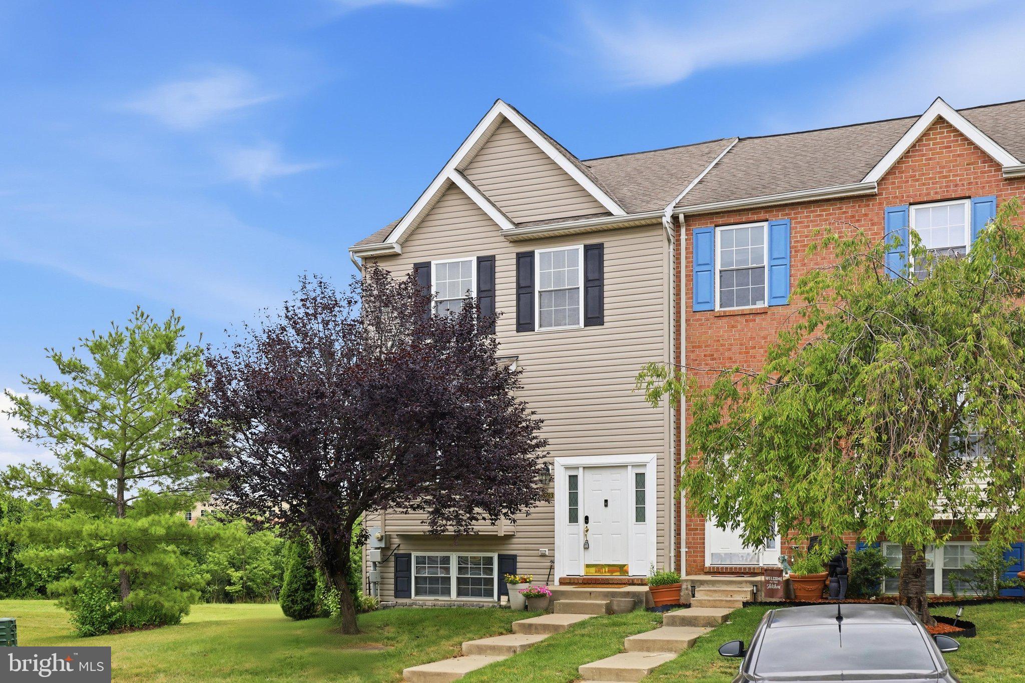 Welcome home to this beautifully maintained, move-in ready 4-bedroom, 2.5-bath townhouse located in a highly desirable neighborhood! Offering a bright, open floor plan filled with natural light, this home is perfect for both everyday living and entertaining. The spacious main level features durable tile and laminate flooring, an inviting living area, and a well-appointed eat-in kitchen boasting granite countertops, abundant cabinetry, generous storage space, and newer stainless-steel appliances, including a new 2026 stove, 2026 washer and dryer, microwave, and a dishwasher that's only six years old. Step outside to the oversized party-sized deck overlooking open common areas and a large green space—an ideal setting for relaxing or hosting family and friends. Upstairs, you'll find generously sized bedrooms and well-appointed baths designed for comfort and convenience. The fully finished walk-out basement provides exceptional additional living space, complete with a fourth bedroom, a full bath, and a spacious recreation or family room, making it perfect for guests, a home office, or multi-generational living. Additional updates include a roof that is approximately six years old. The HVAC system is approximately 20 years old and has been maintained.  Enjoy the convenience of two assigned parking spaces and outstanding community amenities, including a neighborhood pool. With its thoughtful updates, spacious layout, abundant natural light, ample storage, and prime location, this home offers the perfect combination of comfort, style, and value. Don't miss this exceptional opportunity!