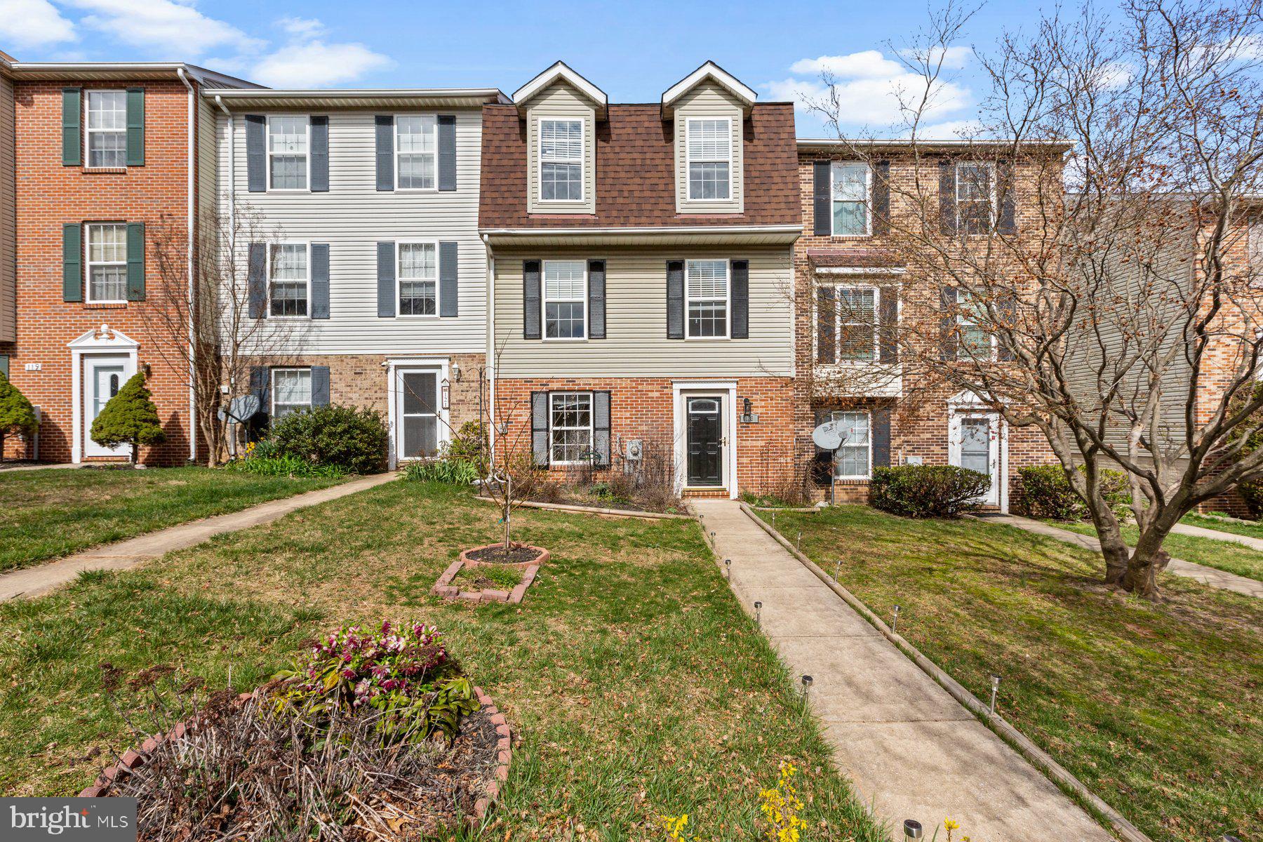 This three-level townhome boasts a convenient location near shopping centers and commuter routes, making it an ideal choice for those seeking accessibility. The kitchen is equipped with stainless steel appliances, updated cabinets, and elegant granite countertops, providing both functionality and style. Hardwood floors grace the main and upper levels, adding warmth and sophistication to the living space.

Enjoy outdoor living and entertaining on the large deck, perfect for relaxation or hosting gatherings. The fully finished basement offers additional living space and includes a walk-out to the backyard space for various activities and a driveway. Beautiful view beyond the rear yard, overlooking an open field full of wildlife.

With two full bathrooms and two half baths, this townhome offers practicality and comfort for residents and guests alike. Don't miss out on this opportunity—schedule a viewing today, as this property is sure to attract attention and won't last long on the market.