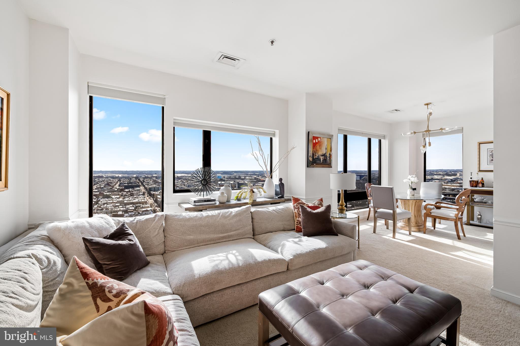 Elegant, bright, and turn-key describe this luxury one-bedroom, 1.5 bath condo in the beautiful Harbor Court. Featuring views toward the outer harbor, M&T Bank Stadium, and Oriole Park at Camden Yards, you'll love the vibe you feel when you walk into this sophisticated condominium. Highlights include an updated kitchen with granite counters, stainless steel appliances including a new professional-grade, $4,000 LG refrigerator and a new built-in microwave. The primary bedroom suite features a beautiful ensuite bathroom with a new vanity console, a large soaking jacuzzi tub, a luxury shower with separate heads at both ends and a large, walk-in closet. There is a full-size washer and dryer and a powder room for guests. Recent improvements include fresh paint, new carpeting, upgraded designer lighting fixtures, high end appliances, bathroom console, and a new Eco thermostat which can be operated from a smart phone. 

This unit has a secure, deeded parking space in the garage and a storage unit. Other building amenities include a 24-hour front desk/concierge, a dedicated doorman, and shared amenities with the Royal Sonesta Harbor Court Hotel -- including reduced rates for residents on the fitness center, indoor pool, racquet/tennis courts, and hotel rooms. In the evening, you’ll love watching the sunset to the south and west over Federal Hill and the beautiful parks of Otterbein. Situated in the heart of the Inner Harbor, one can enjoy walking the Inner Harbor Promenade while also having access to the University of MD Medical Center, Johns Hopkins Hospital, Camden Yards/M&T Stadium, and so many nearby shops and restaurants. Jiffy access to I-395, the MARC Train, BWI, and all major transportation routes.