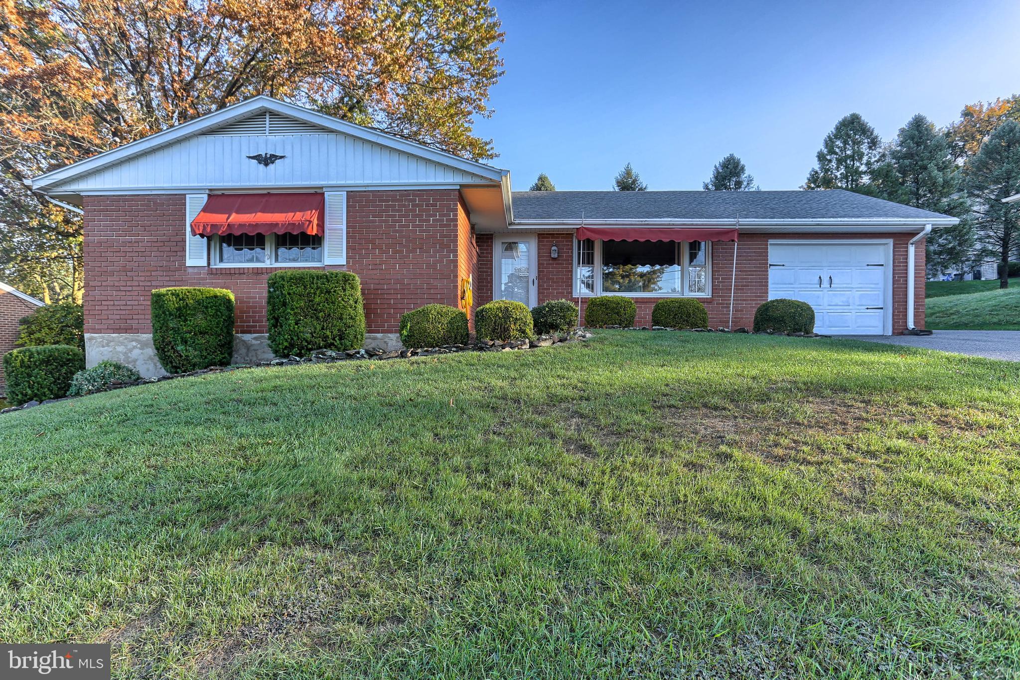 One-owner, solid brick ranch with good bones and nice curb appeal in Central Schools * Outstanding quality in this 3 bedroom, 2 full bath home * Hardwood floors under the carpeting * Living room with a picture window allows for natural light and is open to the dining room * Dining room opens to the bright & cheery sunroom * Kitchen with all appliances, pantry closet and breakfast  bar * Owner's bedroom includes two closets and en suite full bath with walk-in shower * The lower level features a spacious finished rec room, a work room with a work bench and unfinished space for storage * Fenced yard, concrete patio & shed * Gas furnace and central air * Architectural shingle roof * Oversized one-car garage and extended driveway  Great location with easy access to I-83 and convenient to Route 30, ideal for the commuter!