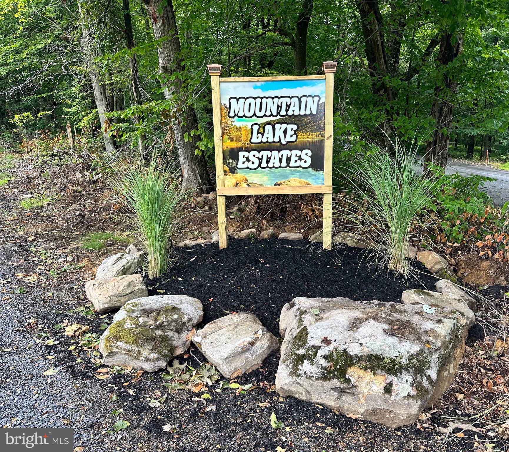 LOT #2 –  “Pineybend”- Road Frontage on one side.  Level Open Pasture Land with Nice Lake View. 75% Wooded,  Very Private Setting. Secluded Building Site on rear of lot. New Survey. Tall Pine Trees for Privacy and Wind Reduction. New gravel main access road. Brand new 6" Pressure-Treated Posts (w/ Welded Wire Fence) around the ENTIRE Perimeter.  Newly installed driveway,  Perc Test Approved.  5 Min.  Drive to Lake. Brand New Public Lake Dock/Ramp. Tons of Parking.  Don’t Miss Your Chance!  Possible Owner Financing!  An Absolute "Wildlife Hotel" w/ Deer, Turkey & Squirrels Abound.  Sensible Protective Covenants w/ hunting & shooting allowed.  JUST REDUCED! ACT FAST!