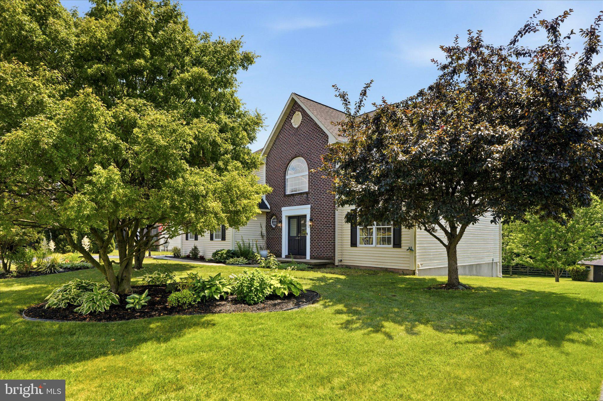 Do not wait any further—this home truly has it all. Welcome to 604 Farmingdale Drive in the desirable Wood’s Edge community. The beautifully landscaped front yard features a newly sealed driveway and a two‑car garage. This exceptional lot offers a serene backyard retreat overlooking a small farm and is just a short walk to community walking paths, pickleball/tennis courts, soccer field, two playgrounds, and a basketball court.
This Malvern III model, built in 2003 by Grande Construction Co., offers 2,700 sq. ft. above grade plus 1,100 sq. ft. of finished basement space. The home includes 4 bedrooms and 3.5 baths and is known for its spacious layout and timeless design. The impressive two‑story foyer features a Palladian window filling the space with natural light and highlighting the soaring 17‑ft ceiling. During construction, the homeowners selected several upgrades including a curved staircase, second‑floor laundry, Super Seal Insulation Package, and the Christmas Light Package with a dedicated switch controlling the front‑facing window outlets. A brand‑new foyer chandelier has also been installed.

To the right of the foyer is a private office/sitting room that can also serve as a main‑level bedroom. All windows are tilt‑in for easy cleaning, and the homeowners added brand‑new blind window treatments on both the first and second floors. Continue to the eat‑in kitchen with kitchenette area, opening to a roomy family room featuring brand‑new carpet and a stone‑accented gas fireplace. Adjacent is a dining room with wainscoting, tray ceiling, new carpet, and a new chandelier.
Upstairs are three spacious bedrooms plus a large primary suite with vaulted ceilings, private ensuite, and a versatile sitting room ideal for an office or reading nook. The suite includes a walk‑in closet and full bath with shower, double vanity, and large jacuzzi tub. The second floor also includes a laundry closet with washer/dryer, an additional full bathroom, and pull‑down stairs in the end bedroom with partially floored attic storage. All bedrooms feature large, lighted closets, and all bedroom and hallway light fixtures have been updated. Additional upgrade: whole‑house fan on the second floor.
The finished basement offers exceptional additional living space, including a second family room, three large flex areas suitable for an in‑law suite, a full bathroom, and a custom bar with cabinetry and mini‑fridge (included), pre‑plumbed for a sink. A corkboard conceals the main water line access panel. A nearby closet houses the Garber water softener system, salt container, and sewage ejector pump. The rear room includes two windows, a closet with the updated HVAC system (York, 2021), and an updated water heater (Rheem, 2019). A condensate line drains into the sump pump for added protection. A second closet contains the electrical panel and large cabinet (included). Additional upgrade: whole‑house humidifier attached to HVAC. A large additional room offers endless possibilities for a playroom, craft room, or extra living space. Two exterior doors lead to the backyard. A switch near the double doors controls the backyard spotlight with two recessed integrated LED motion‑sensor lights and power to the shed, which includes interior and exterior receptacles.
Major update: new roof installed in 2021. Radon detectors located in basement and second floor.

Wood’s Edge is not an HOA but part of the Wood’s Edge Trust with a required membership of only $210/year. Additional features include a two‑car garage with a custom carpenter workspace; garage refrigerator included. Located in Daniel Boone School District with convenient access to shopping, major commuter routes, Hershey, Harrisburg, Lehigh Valley Hospital (6 miles), King of Prussia (30–40 min), Philadelphia Premium Outlets (12 miles), Philadelphia Airport (1 hour), Lancaster (35–40 min), and Reading (25 min).