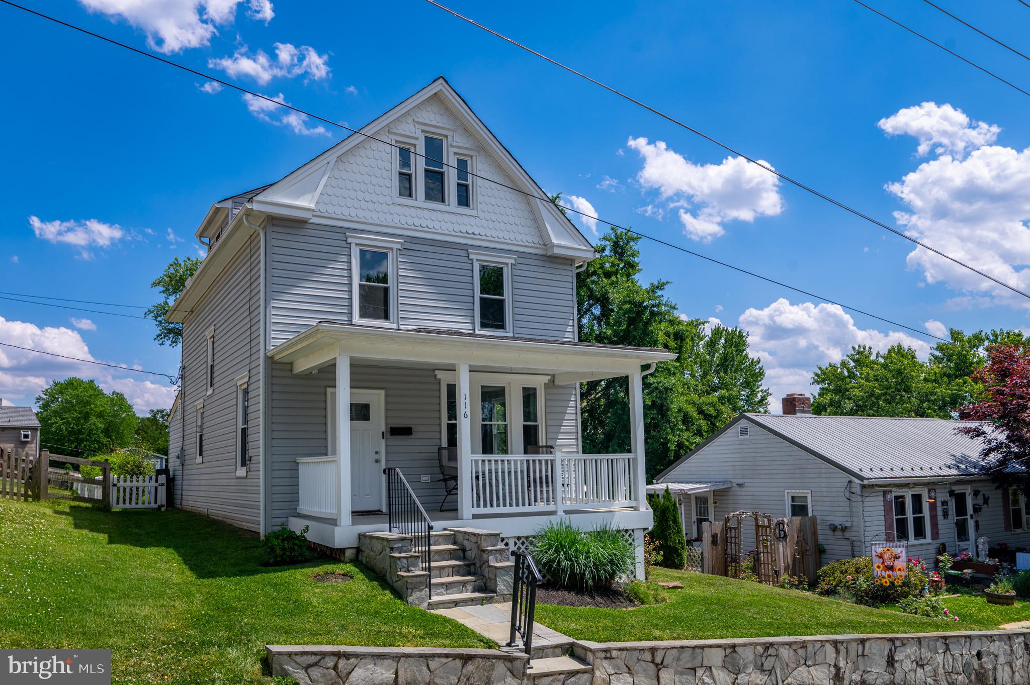 Beautifully renovated from the studs up in 2015, this spacious and unexpected 4-bedroom, 2.5-bath home offers the rare Brunswick find of four finished levels while still preserving charming original character and quintessential charm. From the moment you enter from the covered front porch, the home feels bright, warm, and thoughtfully updated, with classic trim details, hardwood floors, generous windows, and a comfortable flow throughout the main level.

The inviting living and dining areas offer excellent natural light and flexible everyday living space, while the updated kitchen features rich wood cabinetry, stainless steel appliances, ample storage, recessed lighting, and a convenient breakfast bar.  In the back of the home, there is a practical powder room, and direct access to the gorgeous backyard through the covered back porch. 

Upstairs, you’ll find well-appointed bedrooms, updated baths, and a truly special top-floor retreat: a private guest bedroom with its own en-suite bath, an uncommon feature for Brunswick and ideal for visitors, extended family, a private office suite, or a quiet studio space. The finished lower level adds even more versatility, with room for recreation, fitness, storage, laundry, or hobbies. With dual-zone central air, the home is designed for comfort across every level. Blending the feel of a newer home with the warmth of original details, this beautifully maintained property offers space, function, and character in a standout Brunswick setting.

The current owner has continued to make meaningful upgrades, including a new top-of-the-line shed with workbench and space for all your hobbies that is not to be missed, a new fence with a gate in the back of the yard for off-street gated parking, redesigned and refreshed landscaping, a new water heater, a new water main from the street, and a new ejection pit. 

Enjoy close, walkable proximity to Brunswick Elementary School, the grocery store, downtown bakeries, the local brewery, restaurants, and all the charm of Brunswick’s vibrant town center. The MARC train makes commuting to Washington, D.C. and points throughout Montgomery County a breeze, while the convenient connecting bridge to Lovettsville opens easy access to Loudoun County, Dulles Airport, and beyond. Outdoor enthusiasts will love being near the C&O Canal and Harpers Ferry National Historical Park, offering superb recreational opportunities for walkers, bikers, and hikers alike. Welcome Home!