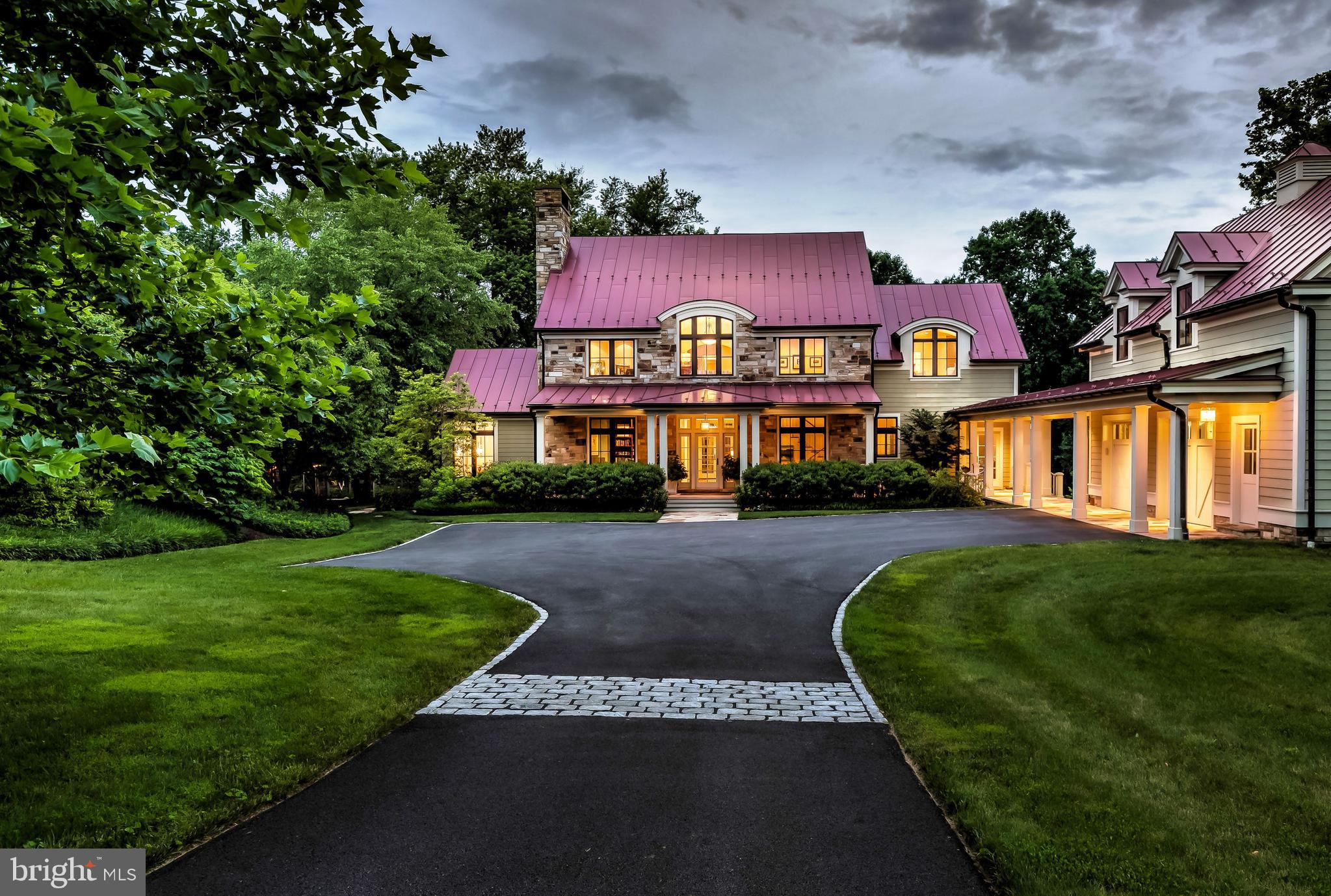 Extraordinary custom stone and hardiplank home designed by Laura Thomas and built by Black Horse Construction in 2003 in a coveted Monkton local.  Beautifully positioned on 14.65 acres of pristine land with a saltwater pool, riding ring, bank barn with 5 stalls and three streams bordering the property.  Every design detail was carefully selected and quality crafted to create warm and inviting family spaces with an elegant yet casual feel.  Inspiring Asscher cut fieldstone, standing seam metal roof, eyebrow windows, cherry floors, Ipe wood porch floors, handmilled railings, rustic bank barn and Springhouse make this property one of a kind.  As you step on the front Ipe wood porch you instantly feel welcomed as you enter an "L" foyer, 10 ft ceilings, opens spaces and dramatic views. Marvin windows and doors give this timeless classic character, charm and style. Cozy library with gas fireplace and custom cabinetry.  Gourmet Chefs kitchen with maple cabinetry opens to elegant Dining room and chic' California/Great Room Revel with wood burning fireplace, windows with transoms and access to the stone patio. Peaceful screened in porch with magnificent views is conveniently located off Kitchen and Dining Room. Sophisticated First floor master with wood burning fireplace, main level laundry and mud room.  Potential 5th bedroom or in law suite on lower level with lots of windows and walk out entry. Unfinished area above garage has high ceilings, plumbing, electric and is very suitable for an art studio, office or in law suite.  Majestically manicured property featuring brilliant native gardens, 28 tree orchard, berry patch, and mature woodlands. Nestled in the serenity of My Lady's Manor, Hereford Zone schools and is only minutes to Wegmans, Manor Tavern and I-83.