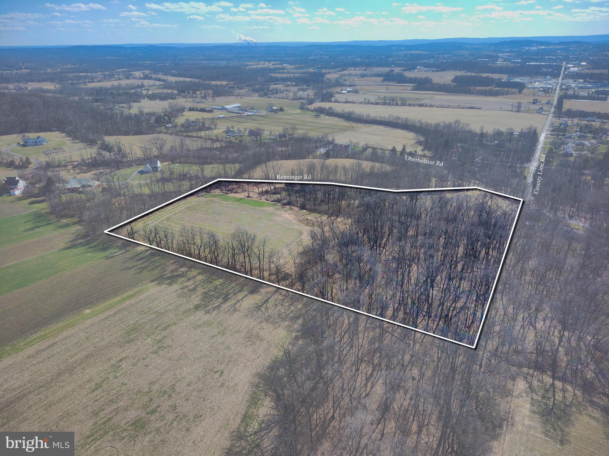 Ready to build your perfect secluded Dream Home? Come check out this lot on County Line and Renninger Road in Boyertown School District that is Half Wooded and Half Field. You will be in awe of the Beautiful Views this property provides. Tax records show 14.91 acres and The conservation easement plots indicate 15.68 acres. Shown as parcel B on included plot maps. Acreage is in Natural Land Trust conservation and only allows for 1 Residential Home to be built. No Subdivisions. The surrounding acreage is also under Easements which ensure the Land will remain quite and peaceful. Property is enrolled in Act 319 (Clean and Green) and offers a significant tax break. Seller has done Perc Testing and has Township Approval for an Elevated Sand Mound System. Engineering Plans for a home have begun and further advancement is pending conversation easement amendments. Property is on a township maintained, quiet, gravel road. Secluded, YES! But only 5 Minutes from Route 100 and with a few miles of many conveniences such as grocery stores, shopping, etc. Documents uploaded for more information! "Driveway" has been cleared off of Renninger Rd for ease with Showings - Please do not block Renninger Rowadway and Only View with an Agent!!!