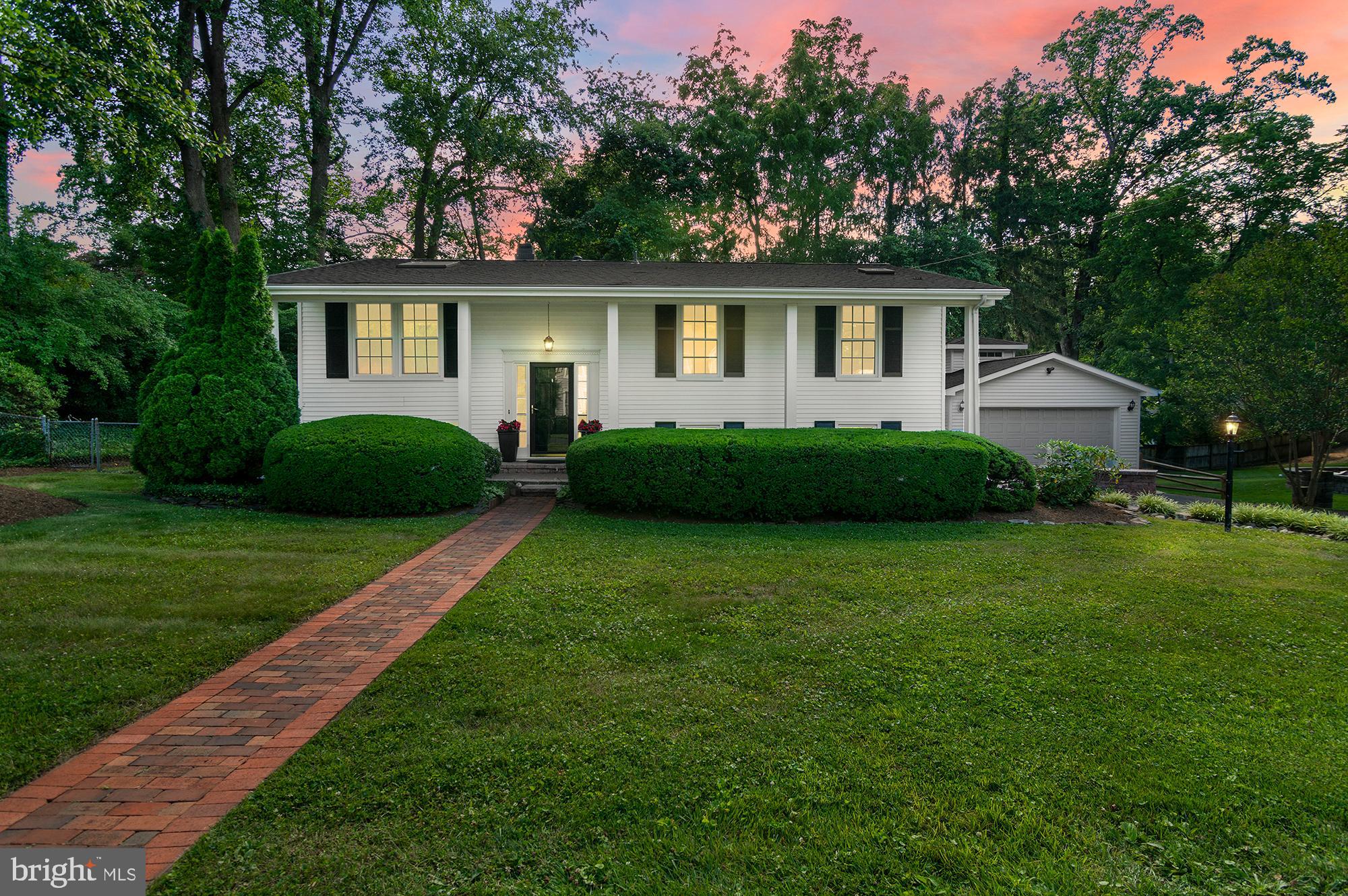 Welcome to 1908 Dulaney Place! This 5-bedroom, 3-full bath home is located in the highly sought-after community of Pendennis Mount. Perfectly positioned just over the Naval Academy Bridge, this exceptional location offers quick access to the U.S. Naval Academy, Historic Downtown Annapolis, the Navy Golf Club, Sandy Point State Park, the Chesapeake Bay Bridge, and Maryland's Eastern Shore. Enjoy he highly rated Broadneck School Distric, plus easy commuting with quick access to Routes 50, 97, and 100.

Designed for both everyday living and entertaining, this spacious home offers multiple gathering spaces including a bright sunroom, inviting screened porch with low-maintenance composite decking, and an extended brick patio overlooking the fully fenced backyard. The kitchen features updated appliances (2026) and natural gas is also available for the range. The living room is drenched in natural light with a large sky light with beam detail. 3 Bedrooms and 2 full bathrooms on the main level including the Primary en-suite. The cozy lower level family room is anchored by a gas fireplace insert and has built-in shelving for storage and function. 2 more bedrooms and 1 full bath, plus laundry room and access to the attached one car garage (heated and air-conditioned) on the lower level as well.

The true showstopper is the incredible 600-square-foot detached garage—a rare find! Heated and air-conditioned with an oversized garage door and space for up to four vehicles, it offers endless possibilities for car enthusiasts, boat storage, a home gym, workshop, studio, hobby space, or additional recreational storage.

Thoughtful updates provide peace of mind, including an updated architectural shingle roof with Velux skylights (2024), HVAC and gas furnace (2016), water heater (2016), updated windows, washer and dryer (2026), and exterior power washing (2026). Septic system was installed in 2008 with two dry wells and has been professionally maintained. Additional features include a storage shed, Lead-Free Certificate, and beautifully maintained landscaping.

Offering an unbeatable combination of location, space, and one of the most versatile garage setups you'll find in the Annapolis area, this Pendennis Mount home is ready to welcome its next owners.

*Square Footage is estimated.
*Some photos have been virtually staged.