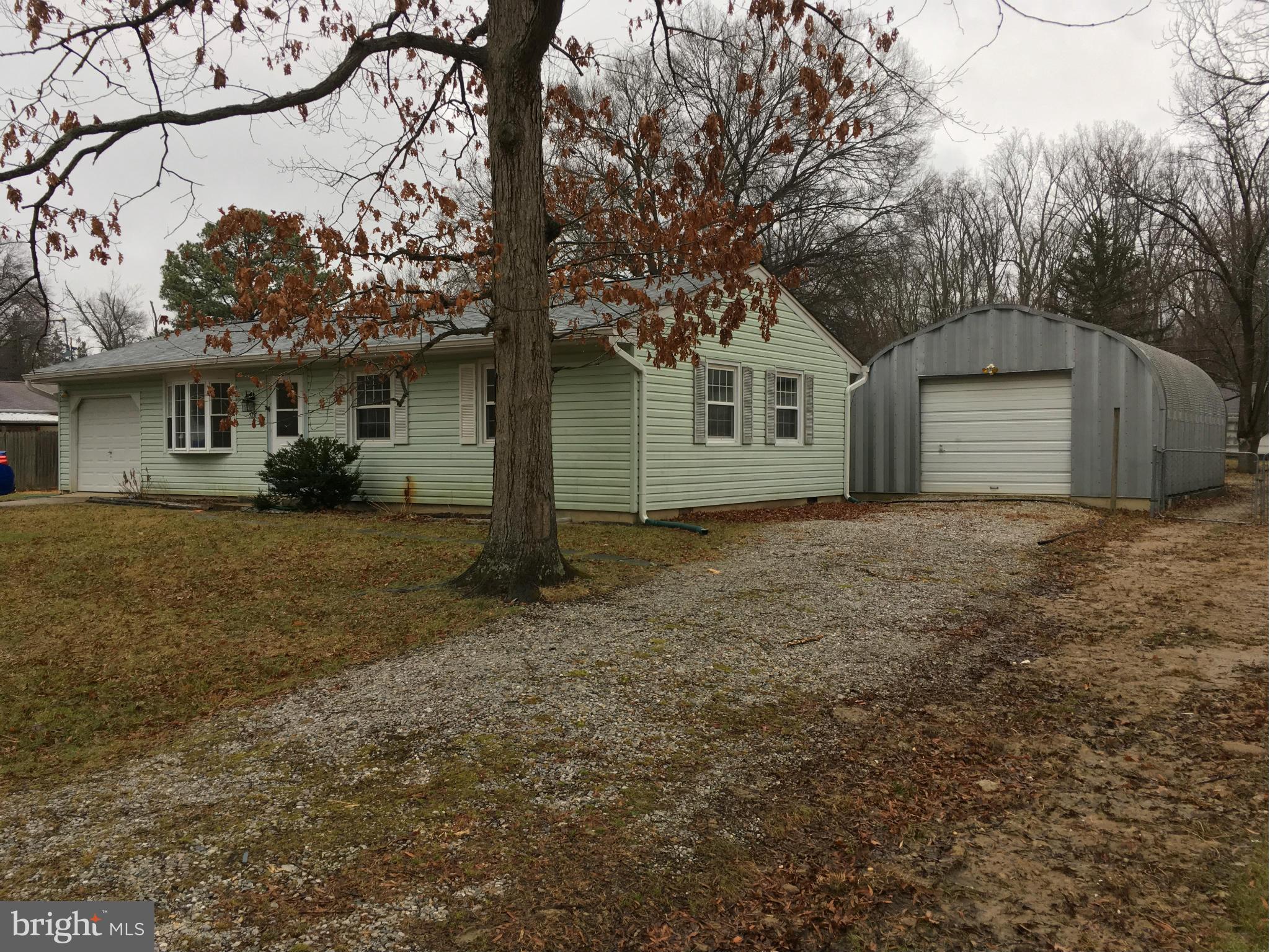 See Live Walk Thru on MeetThisHouse Facebook page. 3 sizable bedrooms with 1.5 baths & 2 living spaces and has new carpet & paint! Step out back and enjoy your large screened in porch overlooking your flat, fully fenced backyard.  A over-sized detached insulated garage is the perfect shop. Wonderful quiet neighborhood with great schools!  Contact listing agent for application and instructions.