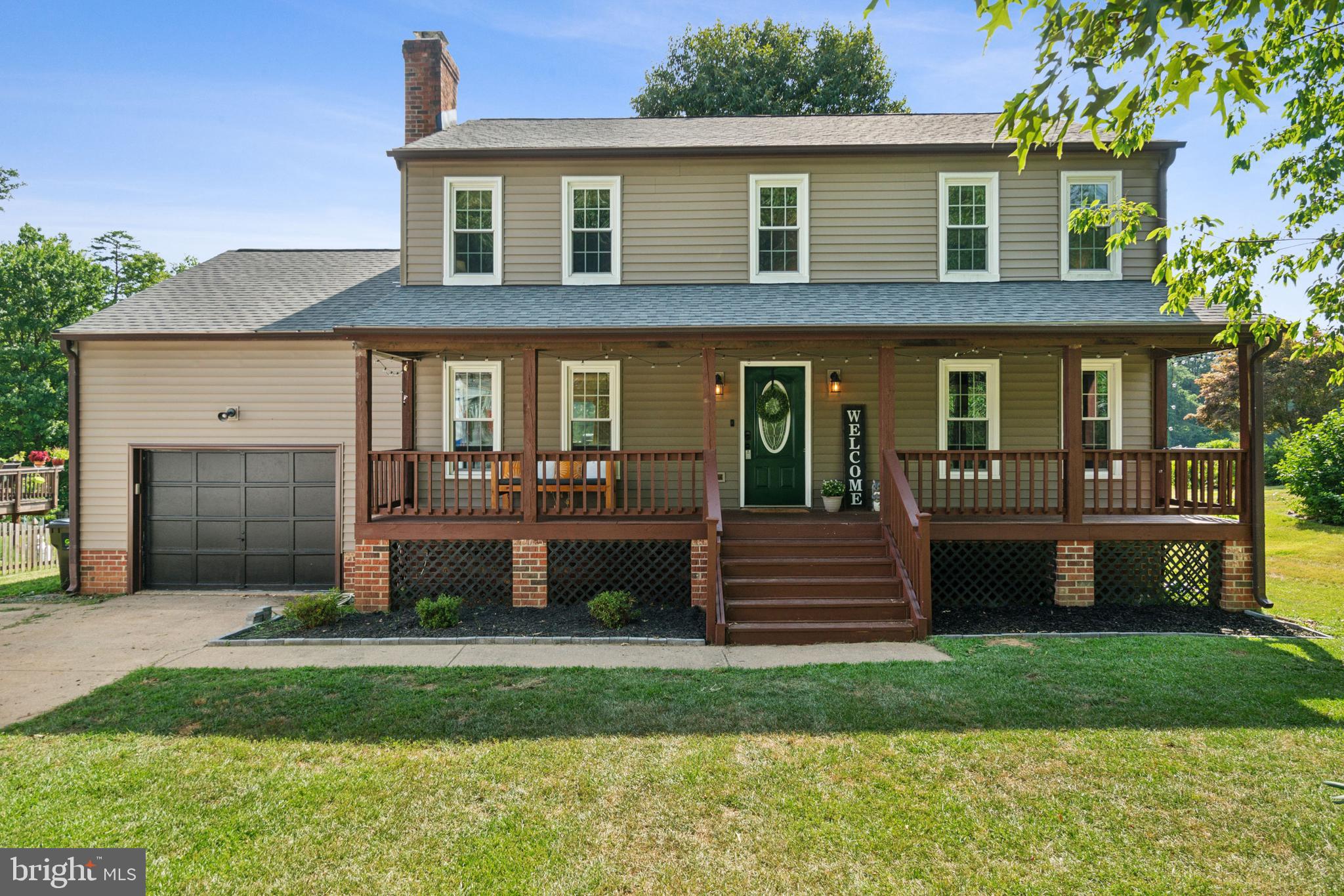 This beautiful home has it all, including a large back yard, perfect for throwing a ball or playing soccer, plus amazing views of Aquia Harbour Golf Club. The open floor plan has a kitchen with granite countertops and stainless steel appliances, which opens to the dining room and one of two family rooms. The other fanily room leads from the kitchen as well, which has a fireplace and sliding glass door that leads to the new deck, perfect for entertaining. The main level has mostly hardwood floors as well as a powder room. Upstairs is four bedrooms, all newly carpeted, which includes a main bedroom en suite with a new vanity. The lower level has a sliding glass walkout, washer/dryer, and a partially finished room for a possible gym, although it's currently used for storage. There is plenty of space for a workshop, or or other possibilities. The long, high-roofed mechanic's one-car garage can contain a car lift.. Critical upgrades put Buyers' minds at ease: new roof, new hot water heater, newer siding, newer HVAC unit, and new front steps. Connections are built in for a home generator as well. This house is waiting for you to start enjoying it as much as the Sellers, who are selling to pursue new opportunities out of state.