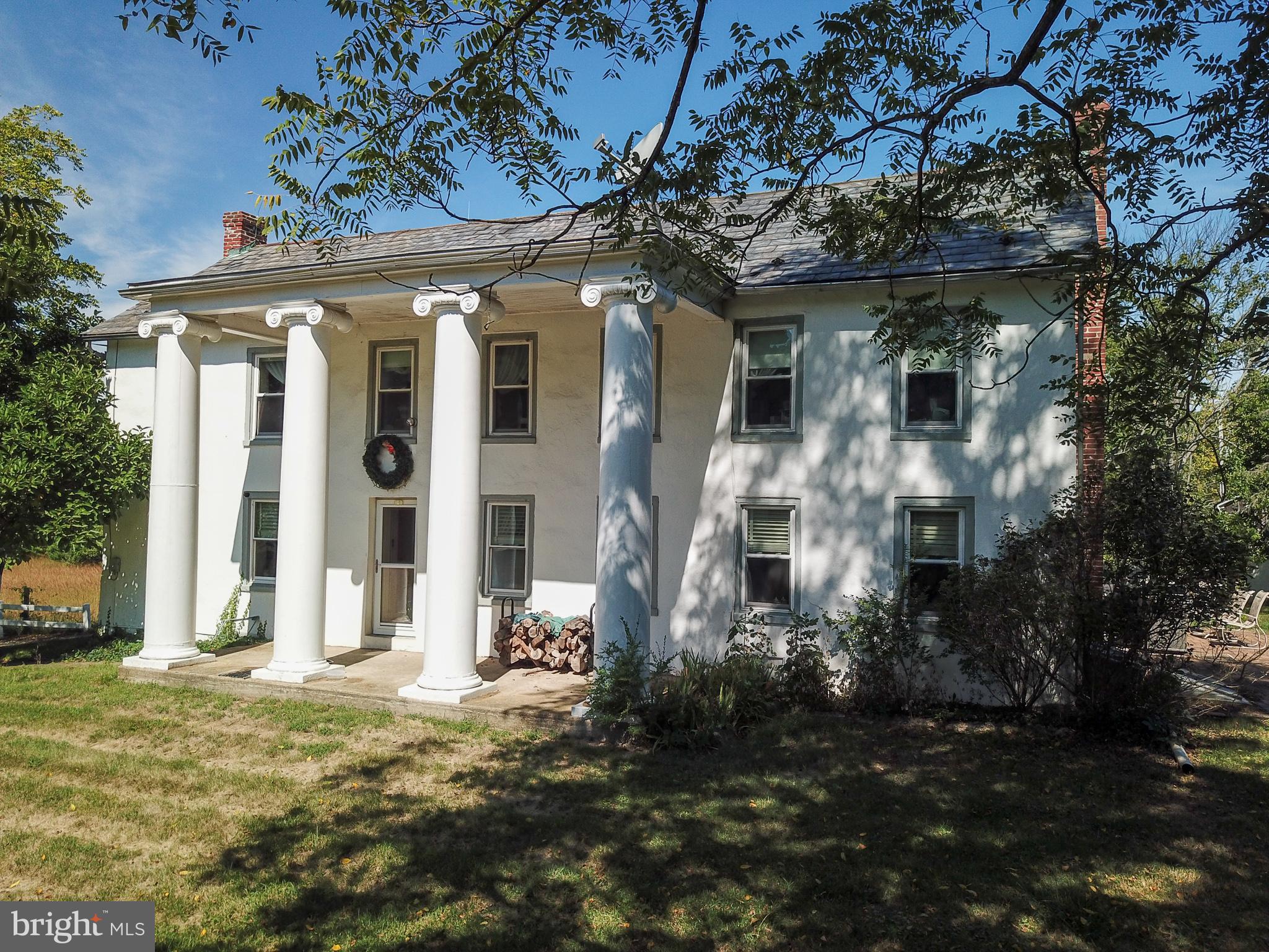 Welcome to your own slice of paradise in Perkiomenville, PA! This stunning 78.1-acre farm boasts a beautiful pond, picturesque woods, well-maintained trails, sprawling pastures, and a charming 3 bedroom antebellum style farmhouse complete with massive Cypress columns with a fascinating history.

As you drive down the private road and approach the property, you'll be captivated by the breathtaking views and peaceful surroundings. The farmhouse exudes warmth and character, with its classic design and cozy interior. You'll love spending time in the spacious living room, which features a fireplace and large windows that let in plenty of natural light.

The kitchen is a chef's dream, with ample counter space, high-end appliances, and plenty of room for meal prep and storage. The adjacent dining area is perfect for enjoying meals with family and friends, while the sunroom is an ideal spot for sipping coffee and taking in the gorgeous views.

The bedrooms are spacious and inviting, with plenty of closet space and comfortable beds. The master bedroom features an en-suite bathroom and a large balcony, where you can relax and take in the stunning vistas.

Whether you're looking for a peaceful retreat, a place to raise animals, or a spot to host events, this property has it all. The pond is perfect for fishing or boating, while the pastures are ideal for grazing livestock. The trails are perfect for hiking or horseback riding, and the woods offer endless opportunities for exploration and relaxation.

This 78.1-acre farm is truly a one-of-a-kind property, and it's waiting for you to make it your own. Don't miss out on the opportunity to own this beautiful piece of paradise in Perkiomenville, PA!