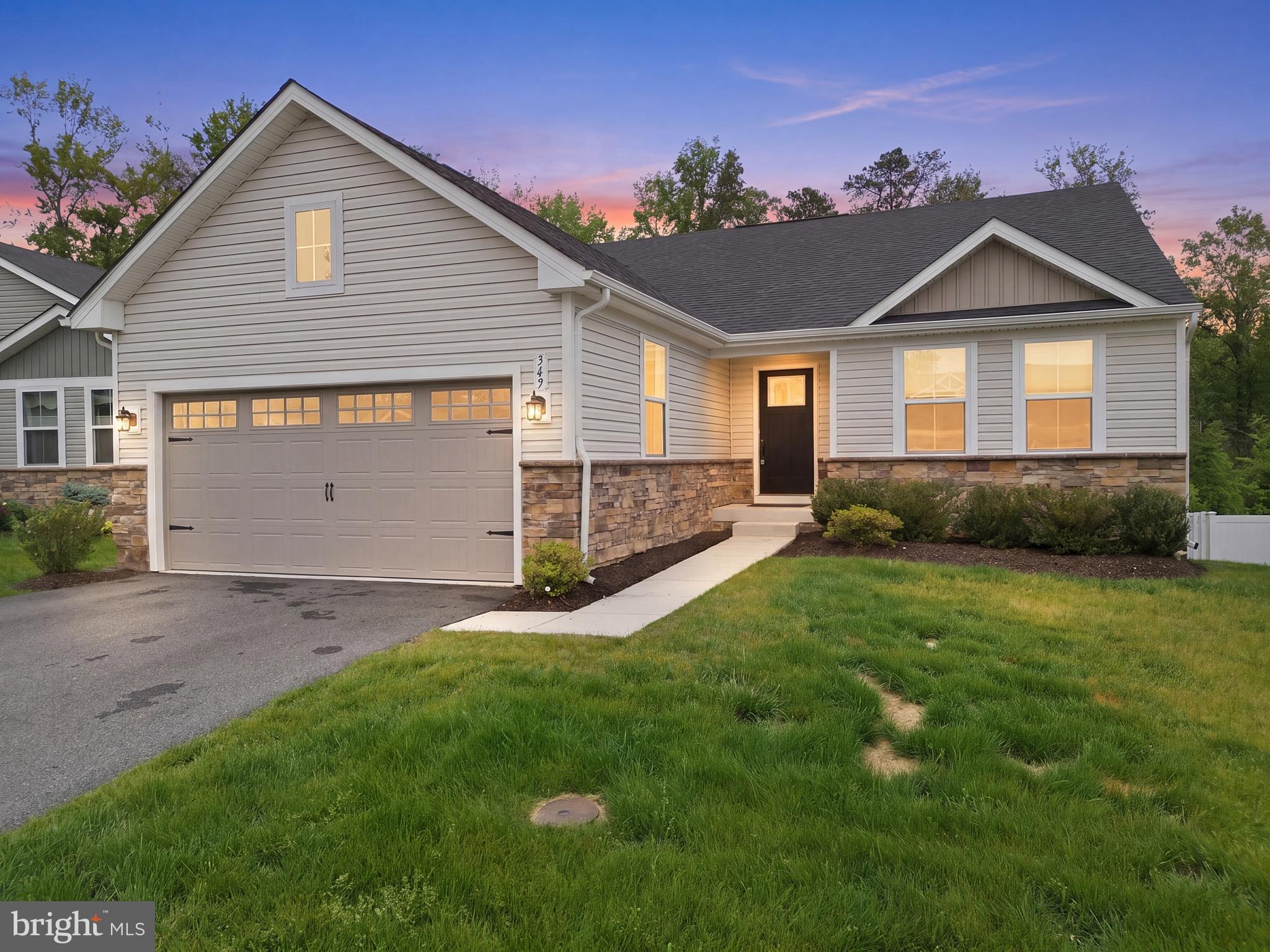 Welcome to sought-after Charlestown Crossing, where comfort, convenience, and thoughtful design come together! Built just 5 years ago, this beautifully maintained ranch home offers the ease of one-level living with an open floor plan designed with space, flow, and functionality in mind.
   The stunning kitchen is truly the heart of the home, featuring rich espresso cabinetry, granite countertops, stainless steel appliances, stainless steel-look cabinet hardware, and a large center island perfect for gathering, meal prep, or entertaining.
   The smart split-bedroom layout places two secondary bedrooms at the front of the home, while the spacious primary suite is privately tucked away in the rear, offering peaceful wooded views. The primary retreat features an oversized walk-in closet and a beautifully appointed en suite bath with double vanity, ceramic tile surround shower, and built-in seat.
   Additional upgrades include ceiling fan/light prewiring in all bedrooms, WiFi-enabled thermostat, garage door opener, upgraded epoxy garage flooring, and a main-level laundry room complete with a deep utility sink.
   One of this home’s most exceptional features is that it is believed to be one of only approximately six homes in the community offering a full walk-out basement, creating an incredible opportunity to nearly double your living space if desired!
   Step outside to enjoy the new composite deck with stairs leading to the backyard, all while enjoying the privacy of mature trees behind the home, a premium setting not commonly found in the neighborhood. Located on a desirable dead-end street ending in a cul-de-sac, this home offers reduced traffic and added appeal.
   Perfectly positioned for commuters with quick access to I-95 and Route 40, while still enjoying the charm of North East, all the nearby waterfront destinations, shopping, dining, and recreation.
   A rare opportunity in Charlestown Crossing...don’t miss it! 
Showings start on Tuesday, June 2nd. Open House is Thursday, June 4th 5 - 7 PM.