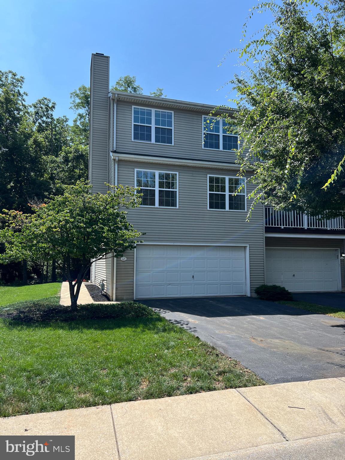 Very nice end unit townhome in Woodside Court.  New carpeting in living room, stairs and all bedrooms. 
 Hardwood flooring in kitchen/dining area.  Large freshly stained deck with privacy lattice and lower level patios.  Retreat to your own personal wooded oasis with natural ferns, slates and professionally mulched that is surrounded by the Quittie Creek Nature Park.  The park is a 36-acre wooded recreation area filled with historic landmarks and hiking/biking/walking trails and bridges; and is a terrific place for fishing and exploration.   Don't miss out on this great opportunity to own in a very desirable area!
