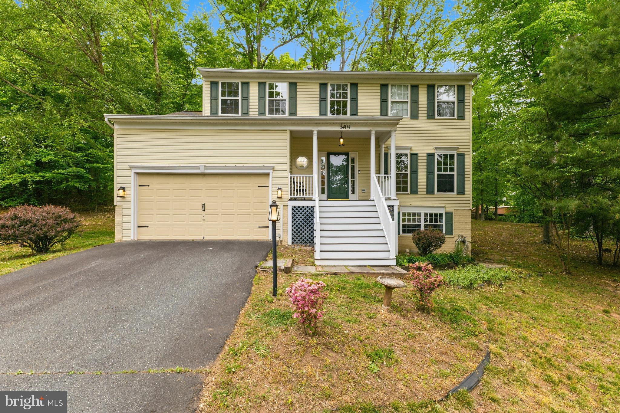 ***NO HOA*** Welcome to the Quantico Creek Community in Graham Park Shores, ideally located in close-in Triangle! Just minutes from MCB Quantico, I-95, and the Virginia Railway Express, this spacious colonial nestled in a quiet cul de sac in one of the few well-maintained neighborhoods with NO HOA! 

This beautifully maintained 5-bedroom, 3.5-bath home with over 3,000 square feet offers the perfect blend of charm, space, and thoughtful updates. From the moment you step inside, you’ll notice the warm oak hardwood floors, elegant crown molding, and a cozy gas fireplace in the family room, which is perfectly situated just off the kitchen and flows effortlessly to a spacious deck.

The kitchen and bathrooms have been tastefully updated, creating a move-in ready feel while still offering room to make it your own. Out back, the oversized yard backs to peaceful wooded views, giving you a private, serene setting to unwind. The stamped concrete patio with a built-in firepit is the perfect spot for entertaining or relaxing under the stars.

Upstairs, the spacious primary suite feels like a true retreat with a walk-in closet and a beautifully renovated en suite bath featuring a luxurious soaking Jacuzzi tub. The second bedroom also offers a generous walk-in closet, while the third and fourth bedrooms are well-sized and share a full hall bathroom, creating a functional and comfortable layout for everyday living.

The walk-out basement expands your living space with a large rec room, full bathroom, and an additional room with a walk-in closet, ideal as a fifth bedroom (NTC), guest space, or home office. This level is perfect for multi-generational living, college students, or even a roommate setup. A dedicated laundry room with abundant storage makes everyday living easy and organized.

For those who love to cook, the kitchen can easily be configured for a gas range, adding even more flexibility to this already exceptional home.
Family Room Carpet Replaed 2026 Roof and siding were replaced in 2018, offering peace of mind for years to come. Water Heater replaced in 2019 
Vacation at home in this peaceful park-like setting near the Potomac River. Enjoy world-class shopping, dining, and entertainment at Stonebridge Potomac Town Center, The Rose Gaming Resort, Wegmans, and Potomac Mills Mall—all just a short drive away. An unbeatable commuter location: less than 5 miles to the VRE, with easy access to I-95, Route 1, MCB Quantico, Metro Bus, Park & Ride, and commuter options to Fort Belvoir, the Pentagon, and DC. Close to parks, Quantico hiking trails, and scenic Quantico Creek—your ideal blend of nature, comfort, and convenience awaits!