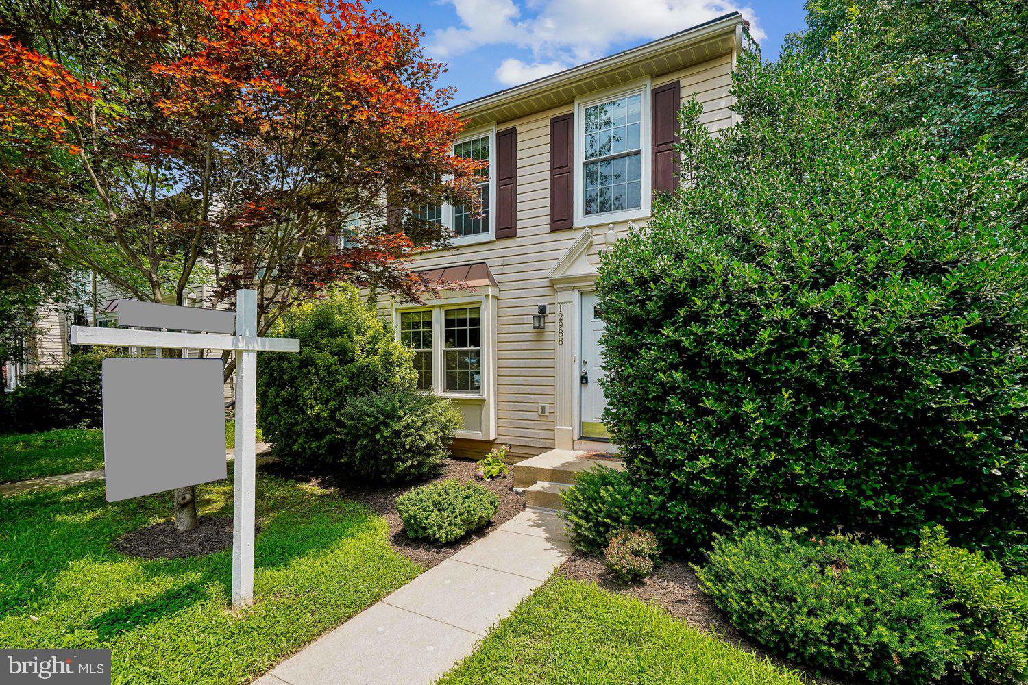 Welcome home to this stunning three-level end-unit townhome nestled in the sought-after Old Bridge Estates community! From the moment you enter, you'll be greeted by gorgeous hardwood floors that set the tone for the beautifully updated space throughout.  The main level boasts a spacious living and dining room combination, highlighted by a striking accent wall that adds character and charm. The updated kitchen is sure to impress, featuring stainless steel appliances, granite countertops, a large center island, and a sunny breakfast nook, perfect for casual dining. Head outside through the rear door to your private deck overlooking the backyard, ideal for relaxing or entertaining.  Upstairs, the primary suite offers a generous walk-in closet and a beautifully appointed en-suite bath complete with a double vanity and a separate shower stall. Two additional bedrooms and a full hall bath complete the upper level.  The lower level features a comfortable recreation room anchored by a cozy fireplace, a perfect retreat any time of year. A convenient half bath, storage room, and laundry room round out the space, with an additional rear door leading to a lower patio.  Don't miss this one, schedule your showing today!