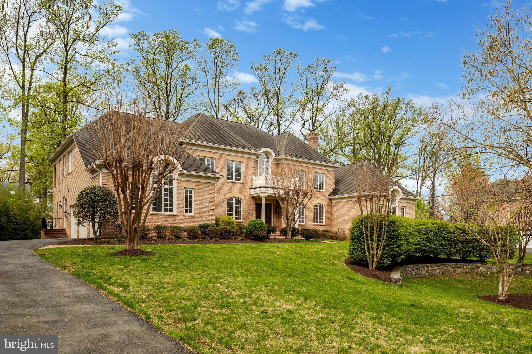 LOCATION!!!NO HOA!!!
Experience grand living in this spectacular detached estate offering nearly 12,000 square feet of living space designed for comfort, elegance, and entertaining.

The main level features 10' Foot Ceilings, a Luxurious primary suite with a private sitting/sunroom, creating a peaceful retreat filled with natural light. This level also includes one full bath and two half baths, a huge library perfect for a home office or study, and a spacious three-car garage. The home offers both a main kitchen and a separate galley kitchen, ideal for entertaining or catering. Living spaces include a dramatic two-story family room, formal living room, formal dining room, and a bright breakfast area. Four Fireplaces add warmth and character throughout the home. Elegant hardwood flooring, a marble-floored grand entrance, and tile flooring in the kitchen enhance the home’s refined interior.

The upper level has 9' foot ceilings offers a Second Primary Suite with its Own bath featuring Dual Sinks, Tub, Walk In shower & 1 Fireplace along with Three more spacious bedrooms, each with its own full bathroom, and an open overlook to the main living areas, creating an airy and impressive layout.

The fully finished light filled walkout lower level with 10' Foot Ceilings is designed for entertainment and relaxation, featuring a huge recreation room, home theatre, wet bar, and wine cellar. This level also includes one bedroom with one full bath & one half bath, a mechanical room, and two walkout basement doors providing convenient outdoor access.

This exceptional property combines luxury, space, and functionality, making it ideal for both everyday, living and large-scale entertaining