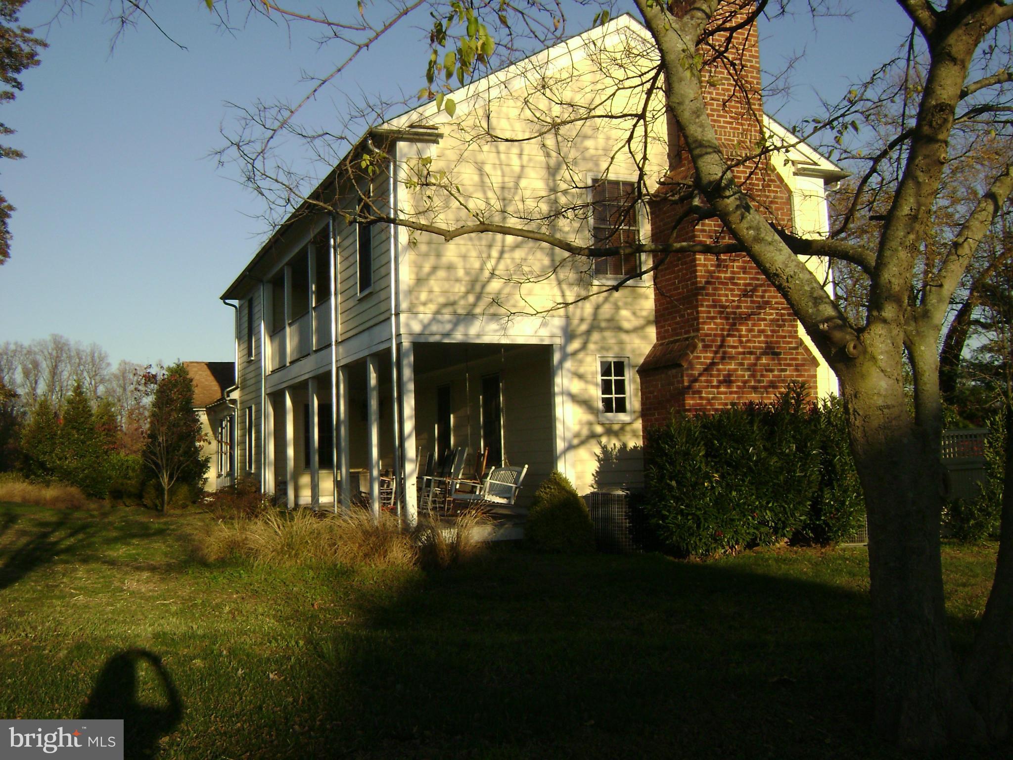 Reduced! Lender approved list price! Historic 1800's farmhouse on 1.4 acres.  Private and pastoral setting of Homeport Farms restored in 2005.  Large liv rm w/ frplc, huge master w/frplc with private porch.  Charming breezeway.  Additional updating required for 2nd & 3rd bathrooms; sellers have design plans for an addition.  To be sold "As Is", need 60 days for short sale approval: 2 lenders.