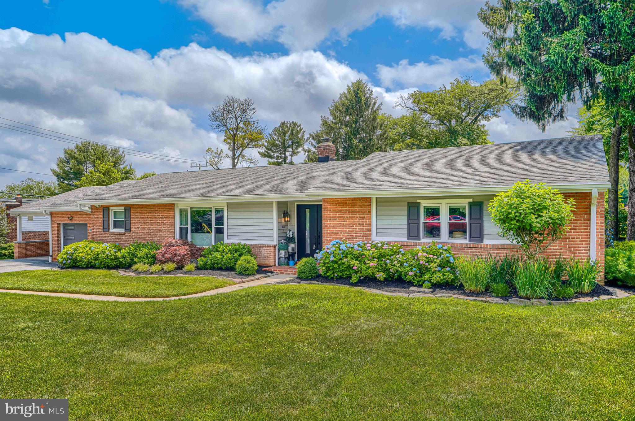 This is truly a rare, but perfect, combination of an ideal location and fully updated, move-in ready home. True rancher with all main-level living on corner, flat lot in quiet, tight-knit neighborhood minutes from shopping, schools, dining and all daily conveniences. An entertainer's dream and/or fun family home featuring an open main Great room with quartzite countertops in kitchen which includes a beverage fridge in the kitchen island and a dining room leading out to a huge patio with built-in firepit and nighttime lighting. Finished lower-level Rec room and Family room with wet bar, 3 under-counter refrigerators and ice maker. Generous sized bedrooms including a primary with walk in closet and private full bath. Overflow storage areas in garage and crawl space. Upgrades include: carport that easily doubles as covered outdoor living space, double-wide driveway holds 4 cars for off-street parking, 6” rain gutters with guards, fully insulated attic, new double front door and garage door, developed landscaping. Included items: Commercial grade washer/dryer, all appliances, window treatments and all wall-mounted TVs (except for master bedroom TV, wall mount will stay). All furniture including pool table is negotiable. Voluntary $50/yr HOA and covenants are located in disclosures. Don't let this gem get away - look for us on the market 6/12.