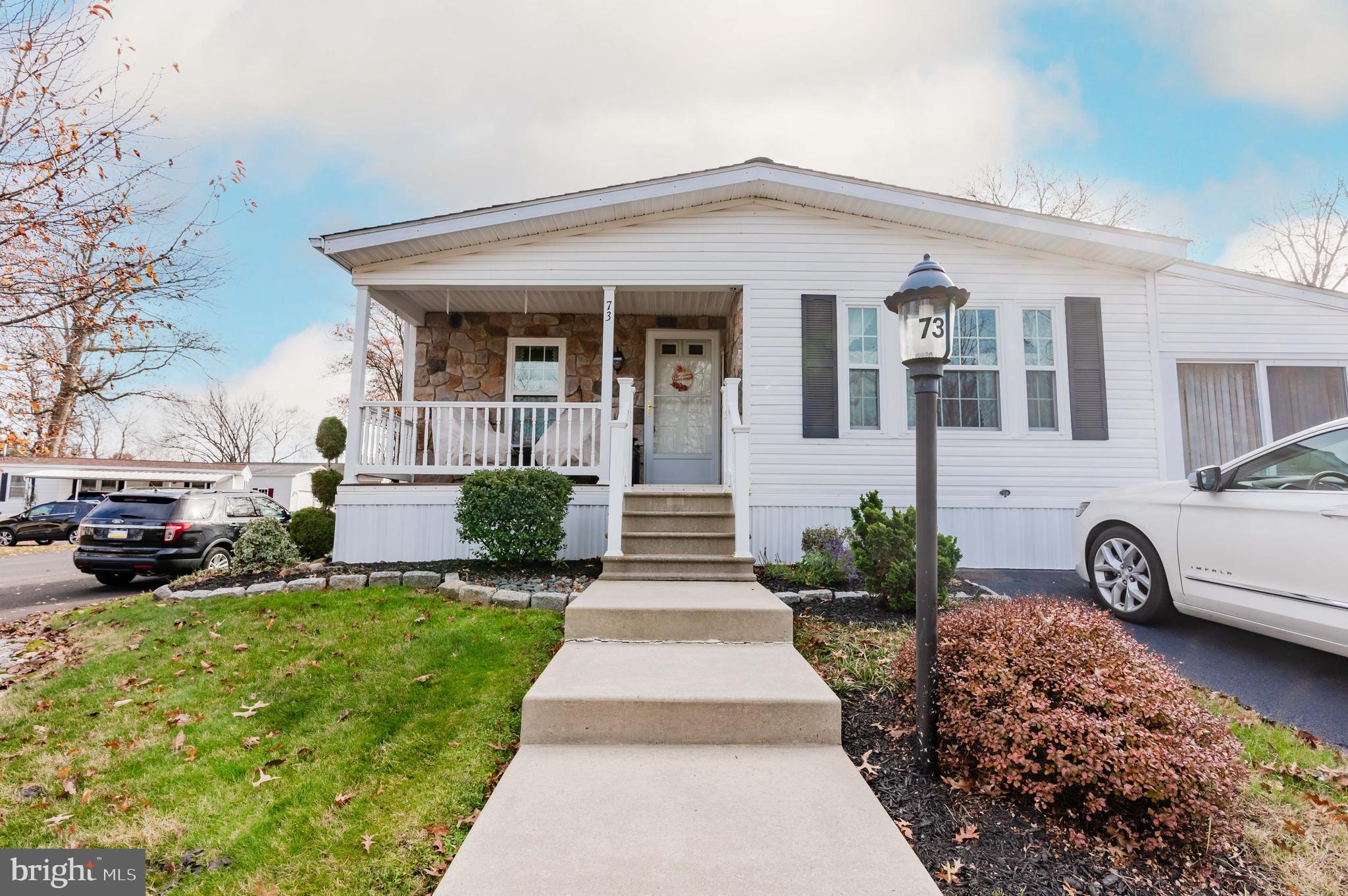 This is a must see home located in a 55 Community. It has a wonderful location, great open floor plan  and loads of closets. As you enter the home you will find a  spacious Living room, Dining room and kitchen with vaulted ceiling. The kitchen is fully equipped with tons of cabinets and  counter space. there are two great size bedrooms and two full baths. In addition, there is a laundry / mudroom. This home has a huge sunroom great for entertaining and parties. This is a very bright home with loads of natural light. There are two spots in the driveway for parking. This home will not last. call for your private showing today!
