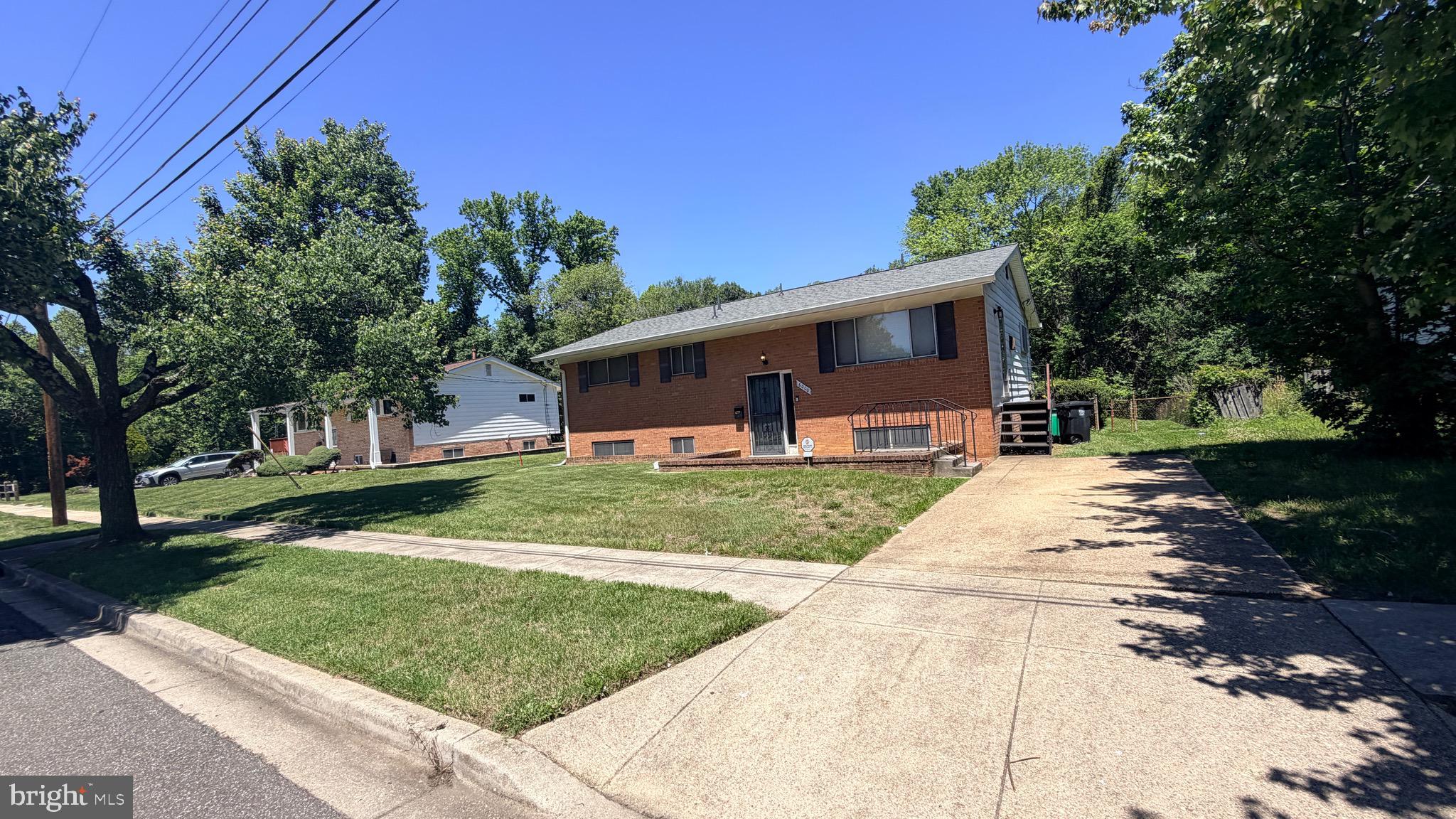 Incredible value and space in Camp Springs! This rare 4-bedroom, 3 Full bath brick split-foyer offers massive space and ultimate peace of mind. This is your chance to own a single-family home for under 300K. Featuring a full brick home with hardwood flooring in the main area, with a newer roof. The fully finished lower level boasts a large recreation room, a 4th bedroom, and a 3rd full bathroom- perfect for multi-generational living or an expansive entertainment hub. This home is a perfect canvas to bring your cosmetic updates to the original kitchen and build instant equity in a prime location, short distance to Andrews Air Force Base. ,495, National Harbor
