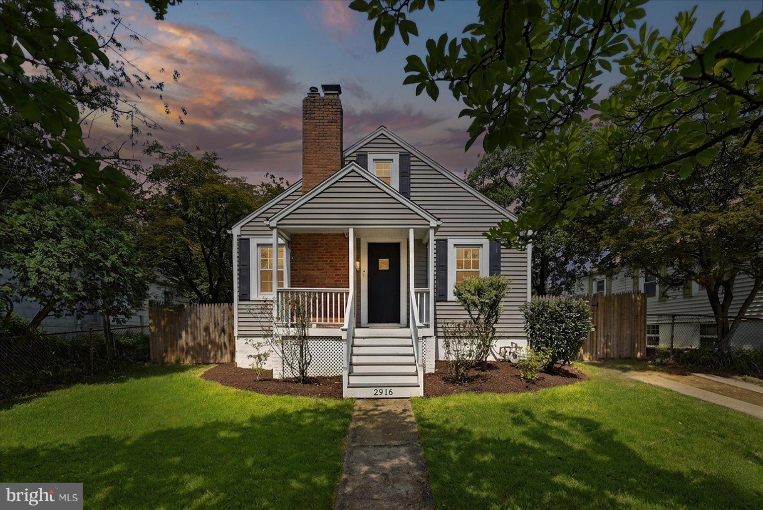 Welcome to a charming Hillwood home that blends everyday comfort, flexible living space, and unbeatable Falls Church convenience. Set in a walkable neighborhood close to parks, shops, restaurants, and community amenities, this home offers the kind of location and layout that make daily life feel easy.

The main level opens to a bright and inviting living room centered around a cozy wood-burning fireplace. From there, the space flows naturally into the dining area and updated kitchen, where granite countertops, stainless-steel appliances, and thoughtfully designed cabinetry create a functional and stylish setting for both casual meals and entertaining. Down the hall are three sunny bedrooms and a full bath, offering comfortable living all on one level.

Upstairs, an additional bedroom is paired with a versatile bonus space that can serve as a home office, playroom, lounge, or guest retreat. The finished basement expands the home even further with another bedroom, a new full bath, and a flexible room that works beautifully for recreation, visitors, or work-from-home needs.

Outside, the recently updated fully fenced backyard is ready for relaxing, entertaining, pets, and play. A spacious patio provides the perfect setting for outdoor dining, weekend gatherings, or quiet evenings at home.

Enjoy all the benefits of Falls Church living, including access to the library, community center, and award-winning Farmers Market. East Falls Church Metro and the W&OD Trail are approximately one mile away, offering excellent options for commuting and recreation. With convenient access to Route 50, I-495, I-66, and Seven Corners shopping, dining, and entertainment, this Hillwood home delivers a wonderful combination of charm, comfort, and connectivity.