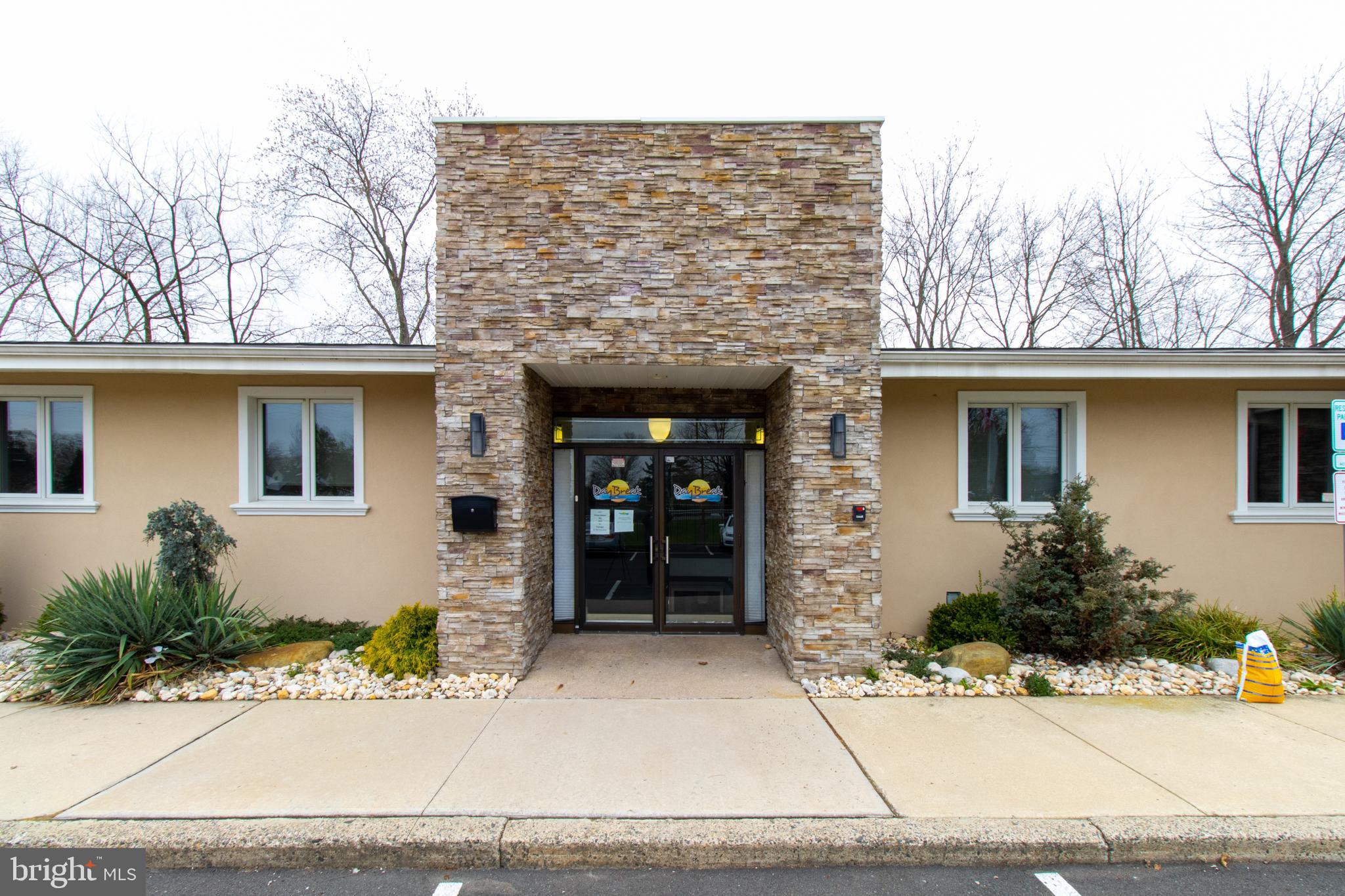 Approximately 9,764 square feet of space situated on 1.07 acres in Middletown Township, Bucks County, PA. This property has undergone a condominium conversion, creating two distinct spaces: Unit I and Unit II.

**CONDO Unit I: 16 Bed Inpatient Residential Detox Facility.  8 Licensed Detox and 8 Licensed Residential.  Purchase of the license may be possible, sale includeds furnishings and equipment currently in place. Licensed in 2020, the Detox Faclity occupies approximately 5,000 square feet across an upper and lower level connected by an internal stairway and elevator. Other use could include Inpatient Mental Health Rehabilitation.

Upper Level:

16 Beds, 8 rooms, each featuring private baths and showers, dual televisions, and individual room temperature controls and electric adjustable beds. Two beds are located in a fully wheelchair accessible unit with a fully compliant shower. Completing this level is a  registration office and a 360 degree nurses station with a secure medication room, 1 medical office with handwashing sink and a seperate half bath complete this floor. 

Lower Level

The lower level is accessible by elevator or a wide staircase. Included on this level are the Kitchen and Dining Areas, a Media room / Group room. A private office / snack room, fully equipped laundry room and two luxurious spa rooms with hot or cold soaking tubs. Each spa room features a full bath with shower and heated towel racks. One half bath completes this level.

CONDO Unit II This unit, spanning approximately 5,000 square feet, is currently licensed as an outpatient drug and alcohol facility.  Entitlements with Middletown Township, Bucks County include zoning and construction documents approvals, that allow conversion of this Condo for use as 16-bed inpatient Residential Detox Facility or as an Inpatient Mental Health Rehabilitation facility. 

Exterior:

The rear area of the property features a gazebo / smoking area and general recreation space.

The property is fenced with an electrically operated gate. The large parking lot easily supports these uses.