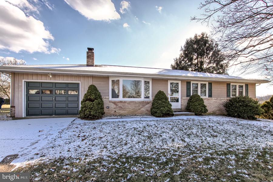 This beautiful Ranch is ready for YOU! Walk into this beautiful home and be welcomed by the beautiful living room with wood burning fireplace. Next head to the  eat in kitchen followed by the 3 large bedrooms. Master bedroom has wood floors, and half bath. There is a lower level family room, and laundry room. Make this your house today!