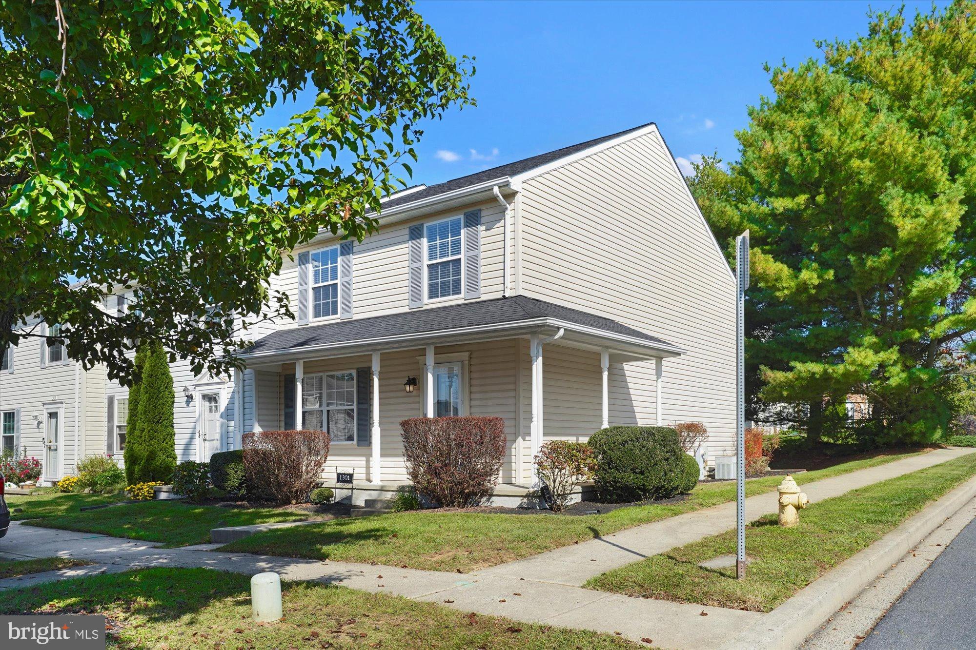 Rear opportunity to  own this end of row Townhouse with 3 Beds 1 Full Bath and 2 Half Baths. Basement has a huge built in bar and a wood fire place. The roof was installed recently with transferable warranty. There are 2 reserved parking spaces right in front of the house. All showings through showing service once the property goes live.
